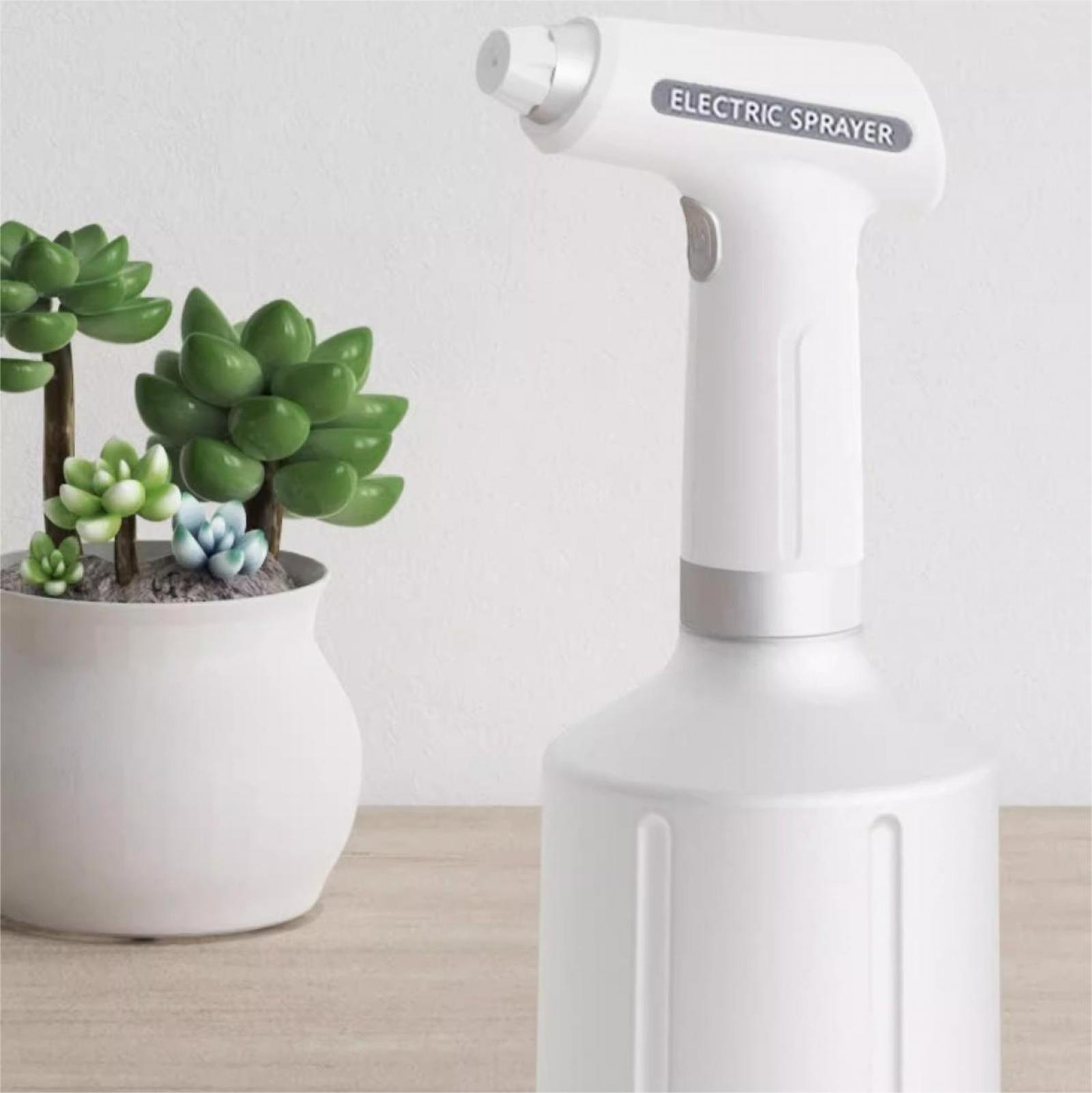 Weißer elektrischer Sprüher mit Text 'ELECTRIC SPRAYER', neben einer Topf-Sukkulente.
