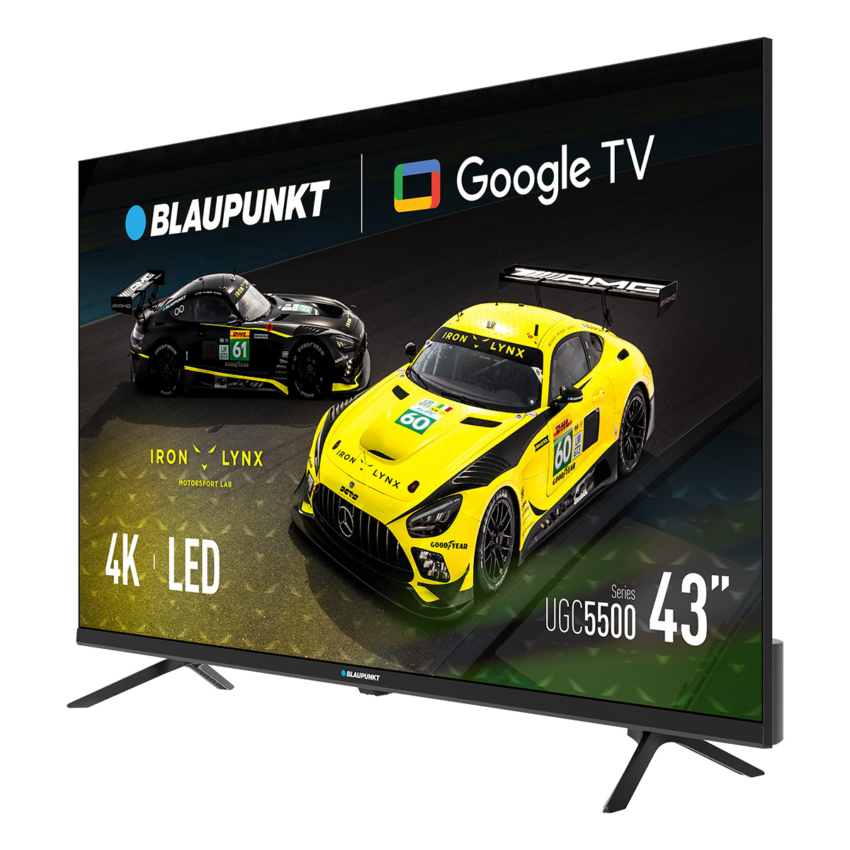 Telewizor Blaupunkt wyświetla dwa samochody wyścigowe, jeden czarny i jeden żółty. Ekran pokazuje 'Google TV' i '4K LED'.