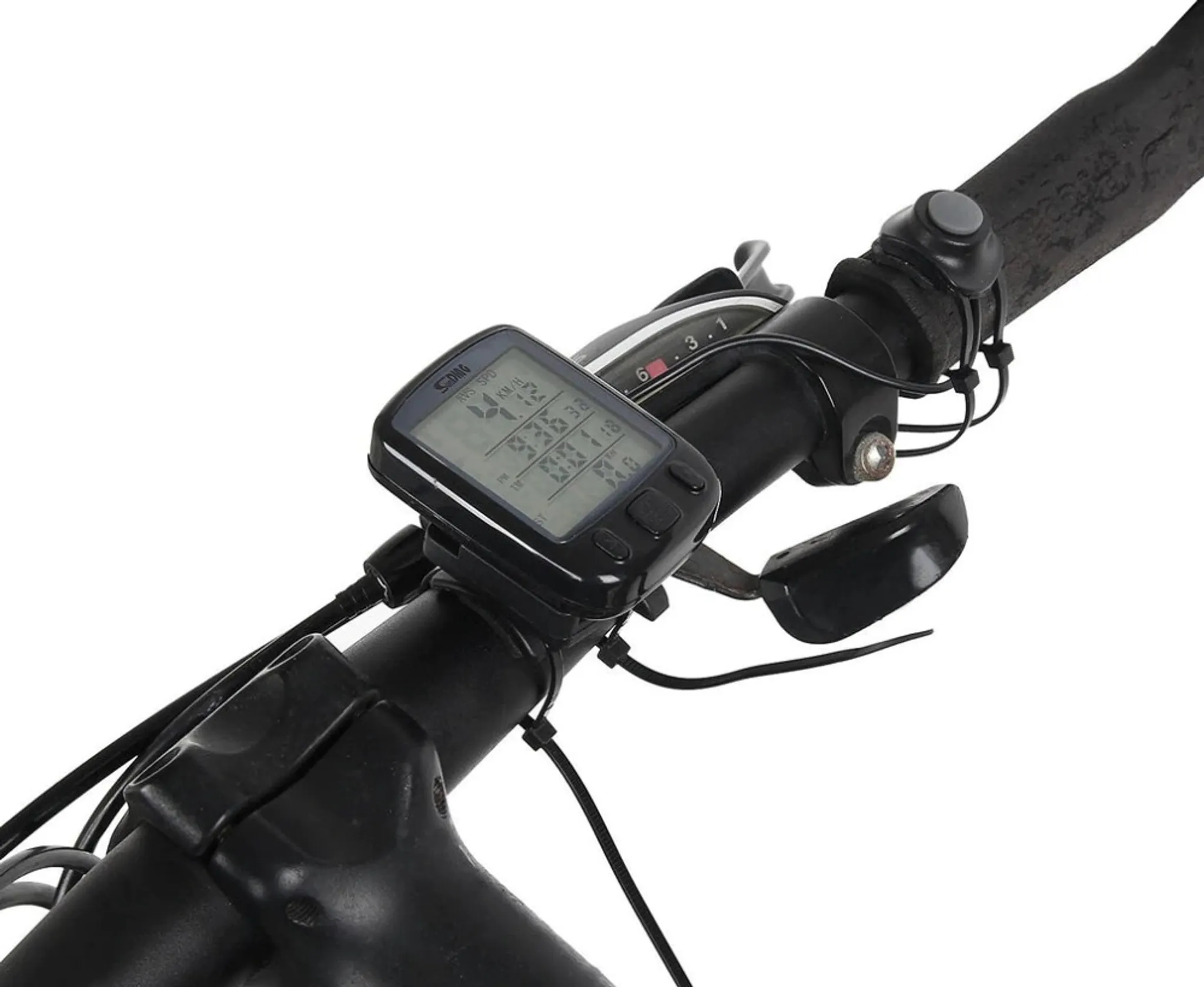 Nahaufnahme eines Fahrradlenkers. Tacho, Gangschaltung und Handgriff sind sichtbar. Schwarz und Grau dominieren.