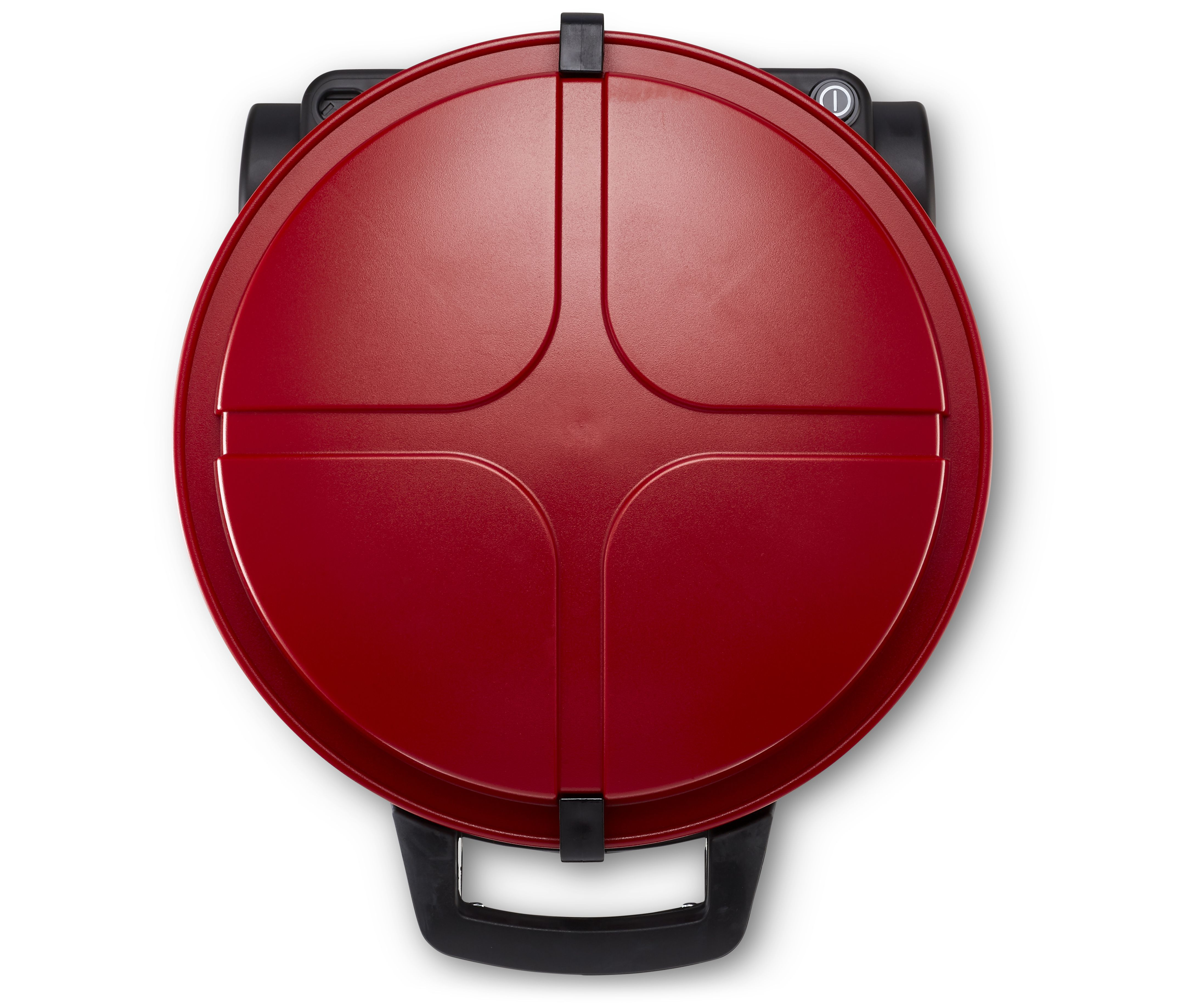 Widok z góry na czerwone gofrownicę. Pokrywa jest zamknięta. Czarny uchwyt i podstawa, białe tło.