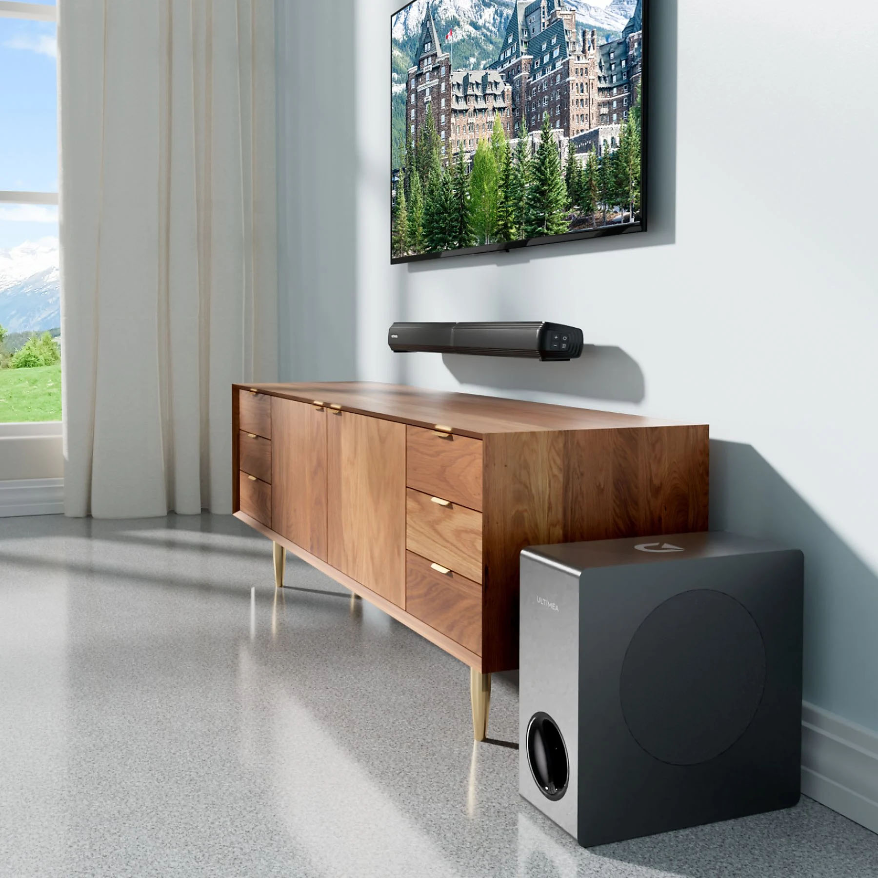 Salon z telewizorem z górskim krajobrazem, soundbarem, drewnianą szafką i subwooferem.