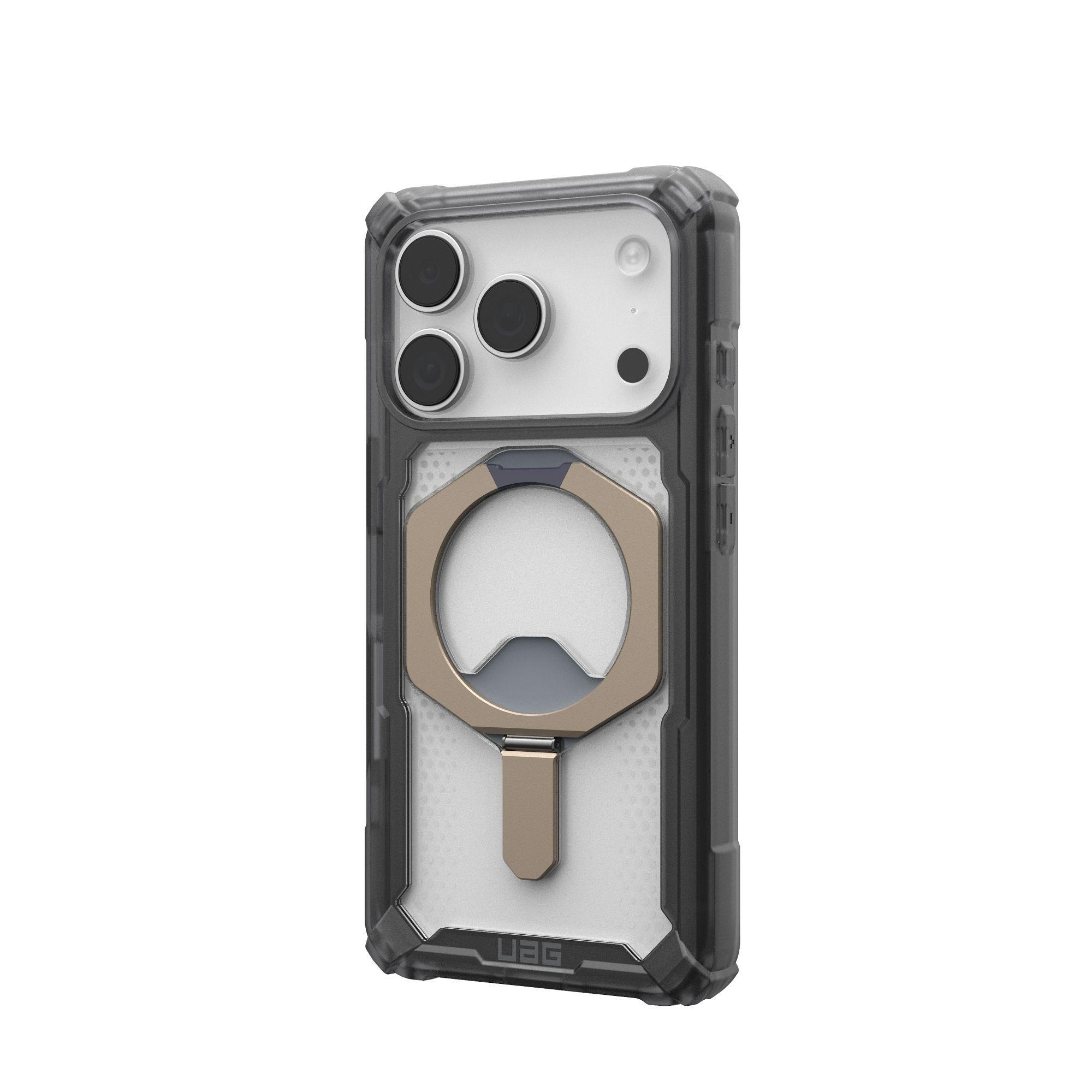 Una custodia per telefono con un anello di supporto. È nera, grigia e dorata. La custodia ha un ritaglio per la fotocamera e il marchio UAG.