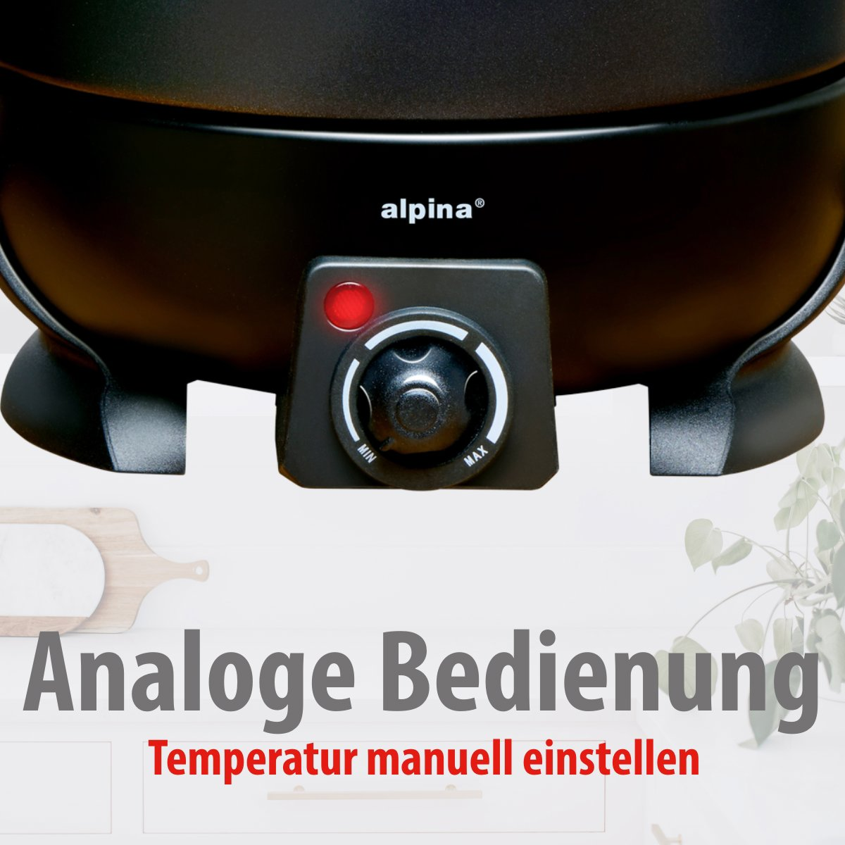 Schwarzes Kochgerät mit Bedienfeld. Rotes Licht leuchtet. Text lautet 'Analoge Bedienung' und 'Temperatur manuell einstellen'.