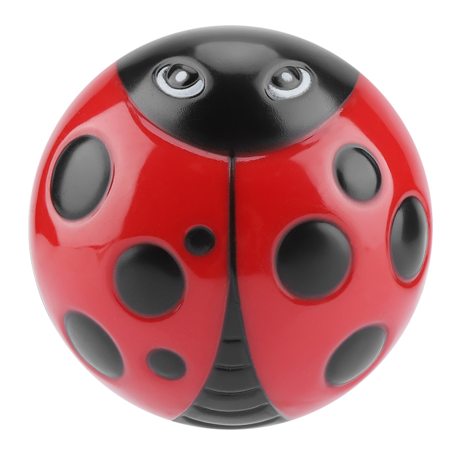 Ein rotes Marienkäfer-Spielzeug mit schwarzen Punkten und einem schwarzen Kopf. Es hat eine runde Form und eine glänzende Oberfläche.