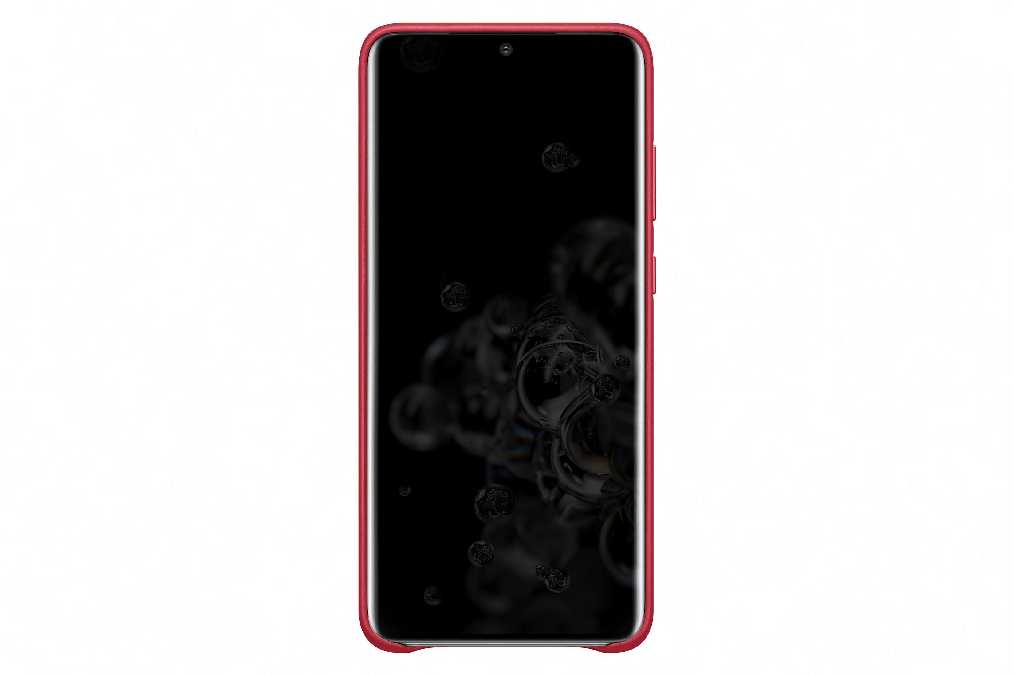 Un teléfono inteligente con carcasa roja y pantalla negra, con formas esféricas borrosas. El fondo es blanco.