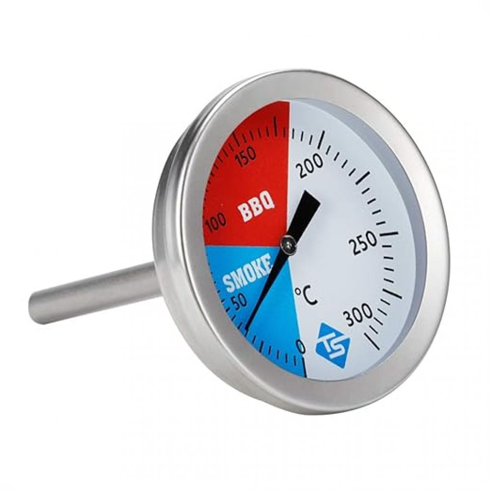 Ein runder Grillthermometer. Es hat ein silbernes Gehäuse und ein weißes Zifferblatt mit Celsius-Markierungen. Das Zifferblatt ist in rot, weiß und blau unterteilt.