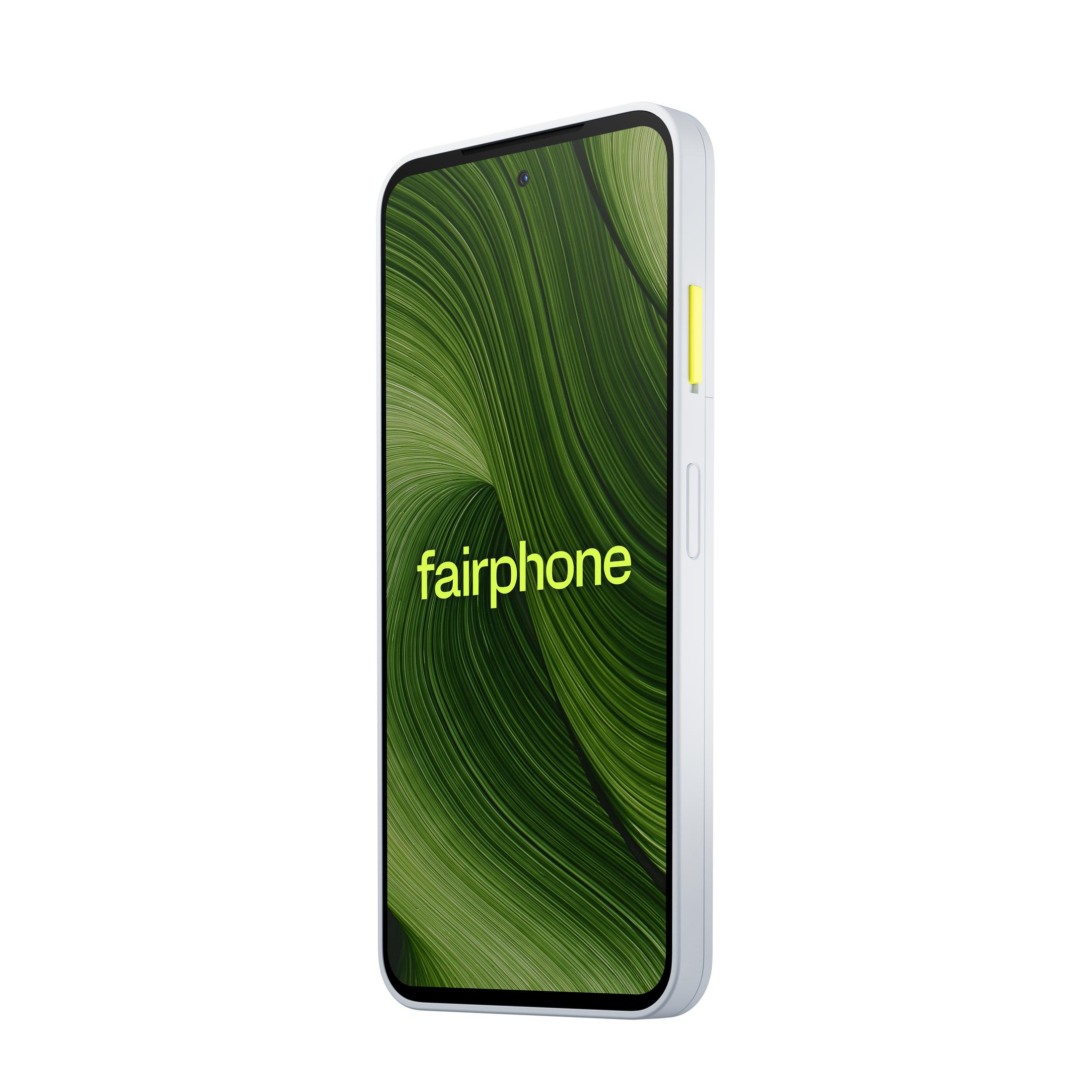 Biały smartfon Fairphone. Ekran wyświetla zielony, płynący wzór. Widoczne słowo 'fairphone'.