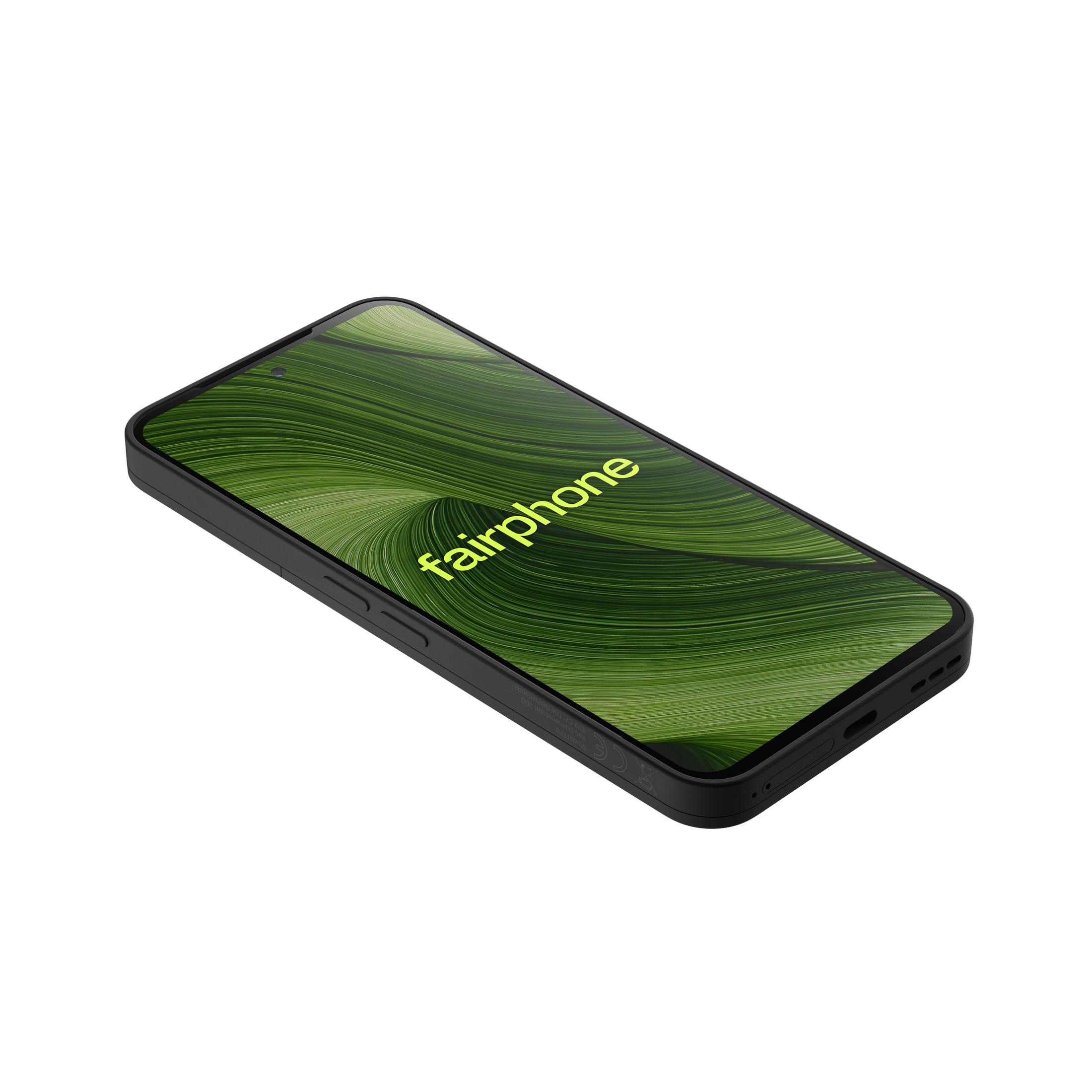 Czarny smartfon Fairphone pod kątem. Ekran wyświetla zielony abstrakcyjny wzór ze słowem 'fairphone'.