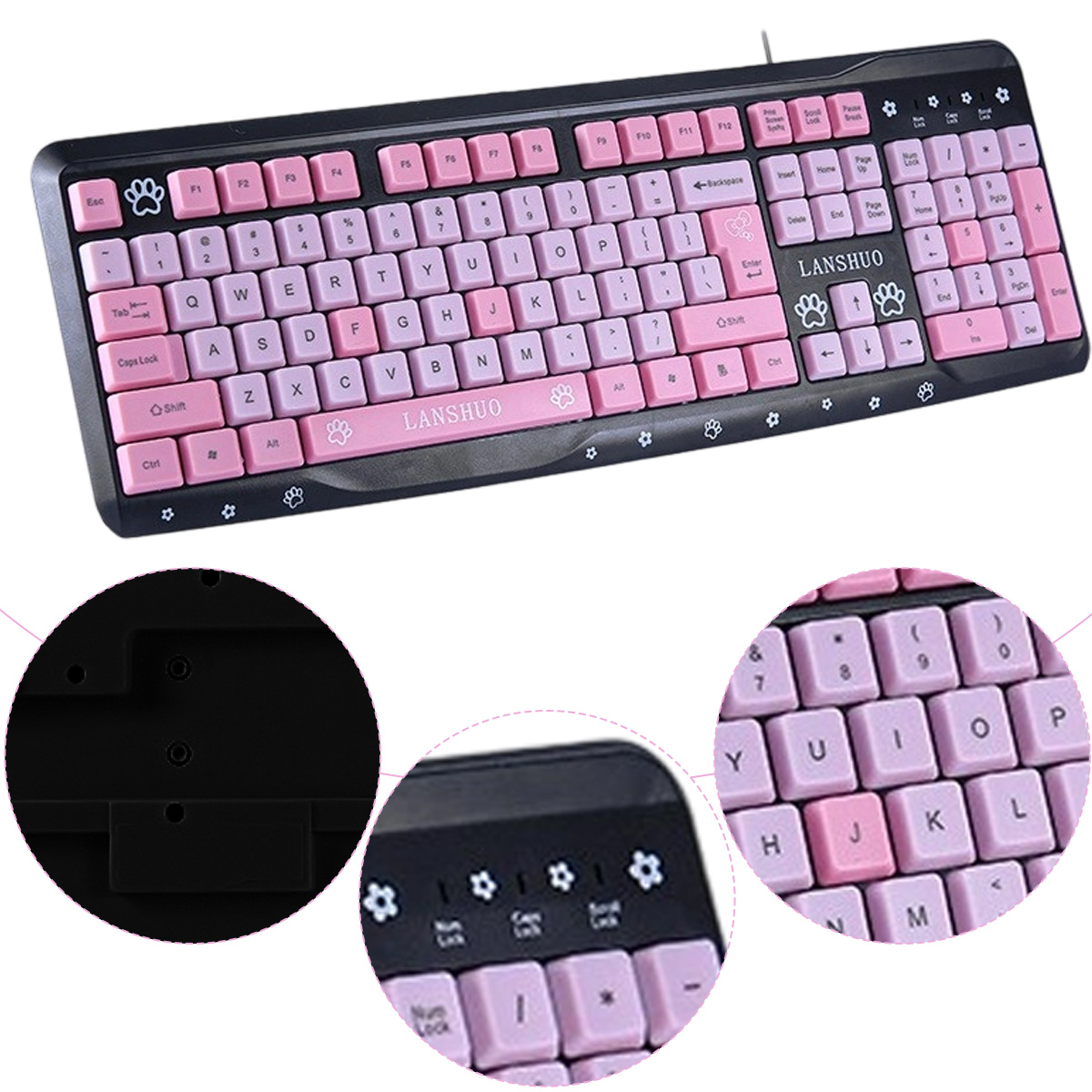 Eine schwarz-rosa Tastatur. Die Tasten sind rosa und schwarz. Der Markenname ist LANSUSHO. Pfotenabdrücke auf der Tastatur.