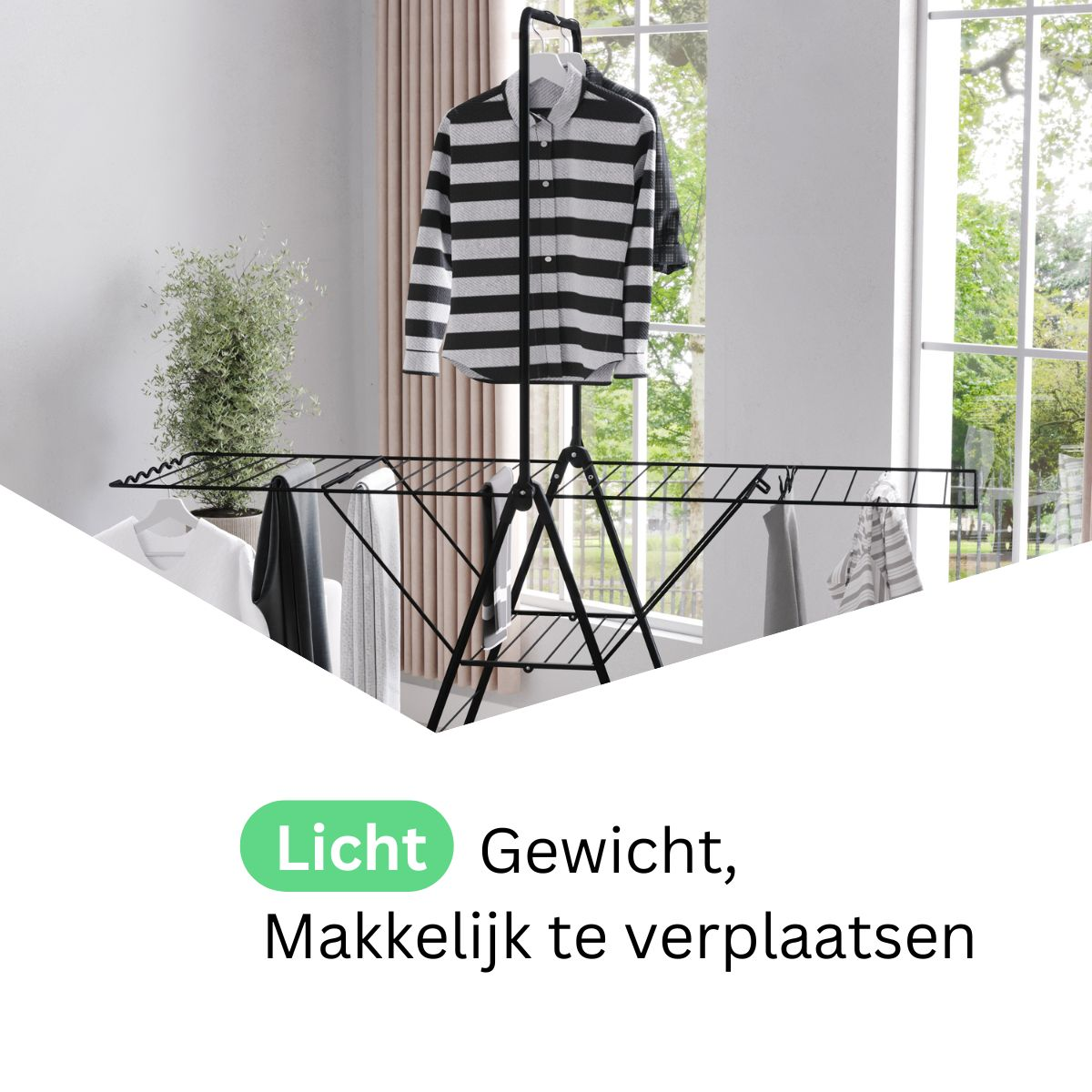 A black clothes drying rack with shirts hanging on it. A plant is on the left. A window is in the background.