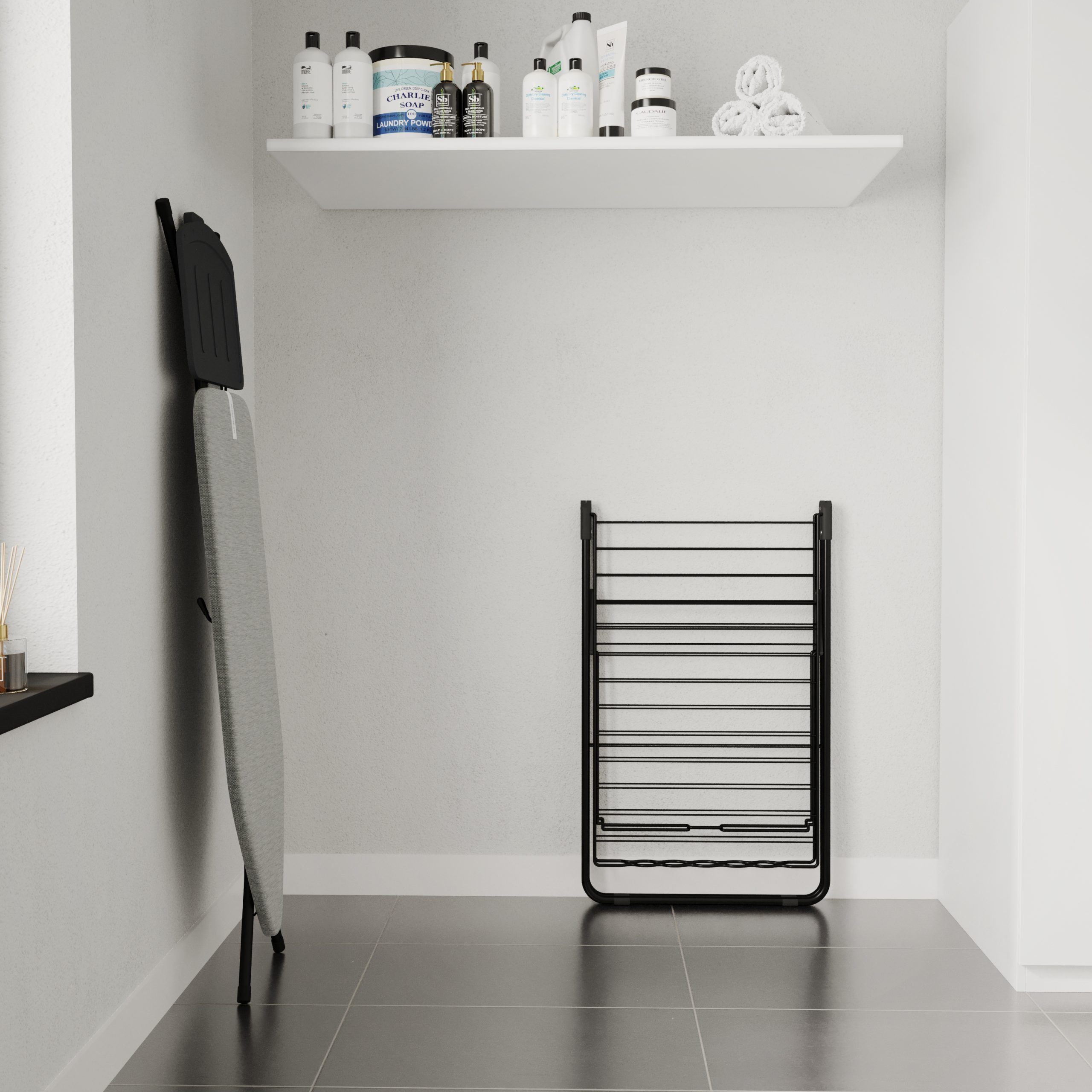 A laundry room with an ironing board, drying rack, and a shelf with cleaning products.