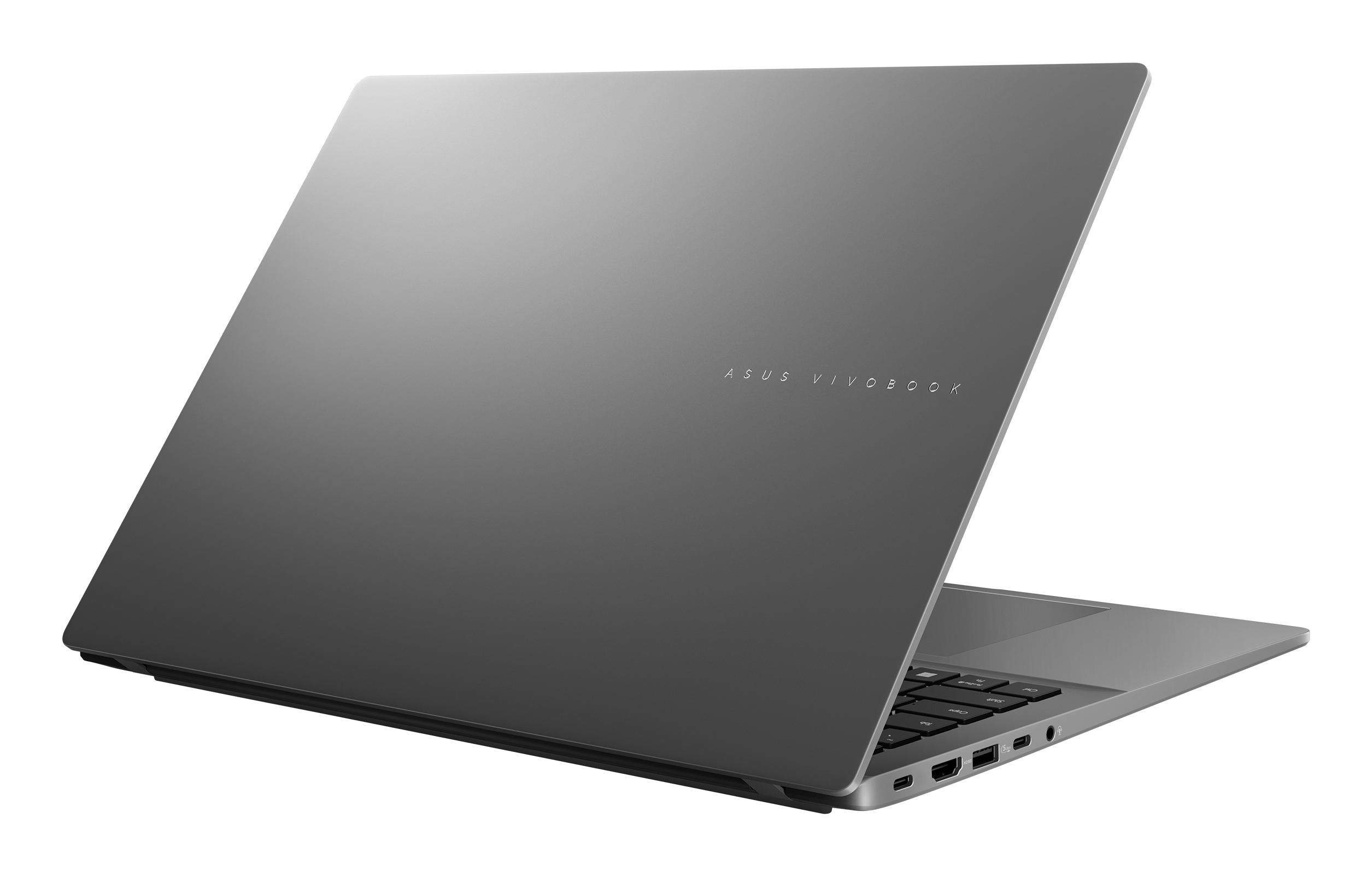 Un laptop ASUS Vivobook grigio, leggermente aperto, angolato verso destra. La tastiera e le porte sono visibili a destra.
