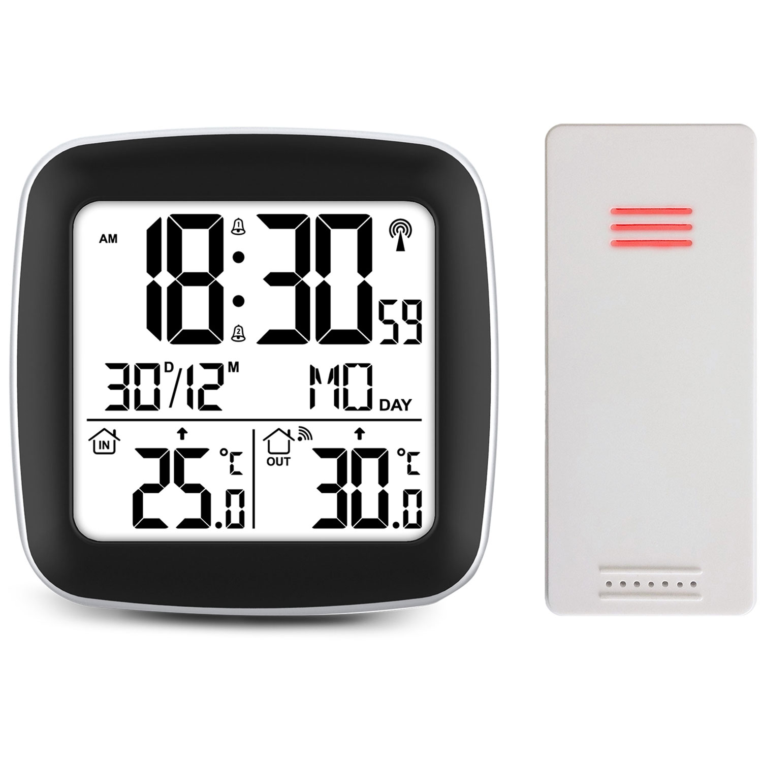 Zegar cyfrowy pokazujący 18:30, z odczytami daty i temperatury. Białe prostokątne urządzenie po prawej stronie.
