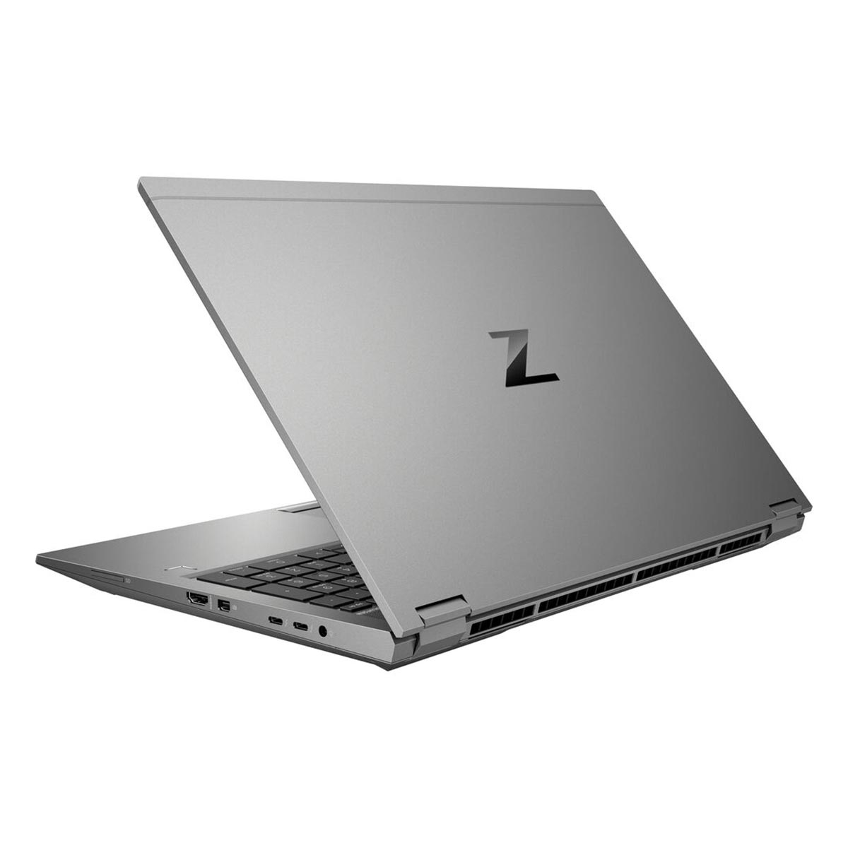 Ein silberner Laptop ist leicht geöffnet. Auf der Rückseite befindet sich ein schwarzes 'Z'-Logo. Die Tastatur ist sichtbar. Der Laptop steht auf weißem Grund.