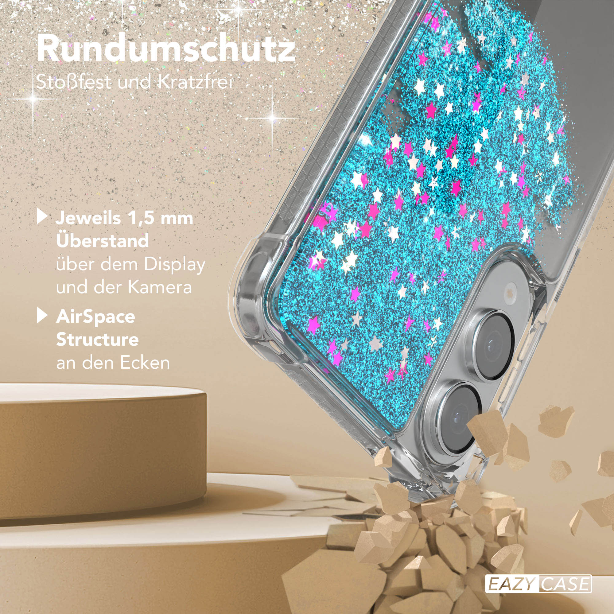 Transparente Handyhülle mit blauem Glitzer und Sternen. Die Hülle ist teilweise auf brauner Oberfläche zerbrochen.