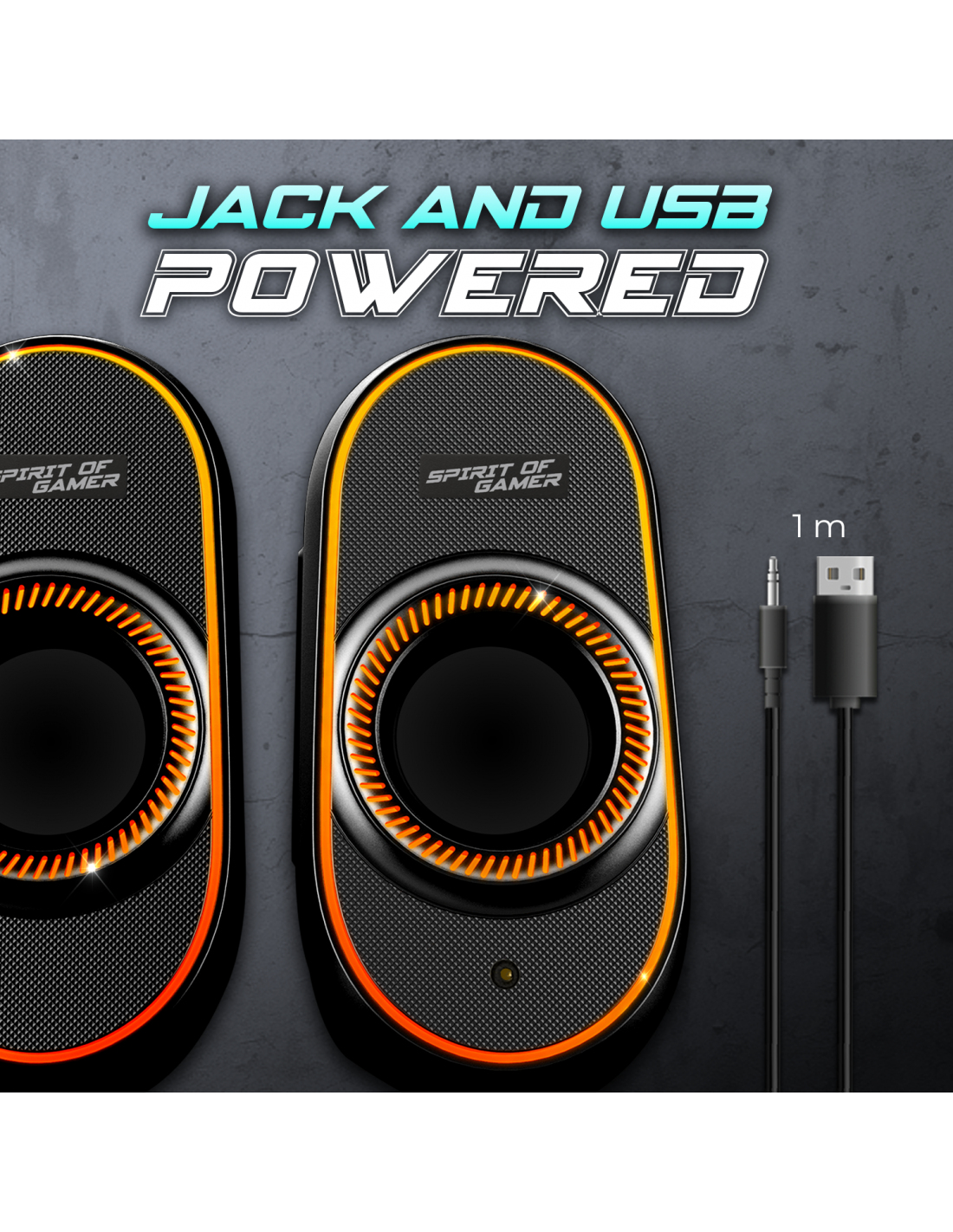 Zwei schwarze Lautsprecher mit orangefarbenen Akzenten. Text lautet 'Jack und USB Powered'. Jack- und USB-Kabel sind sichtbar. Die Marke ist Spirit of Gamer.
