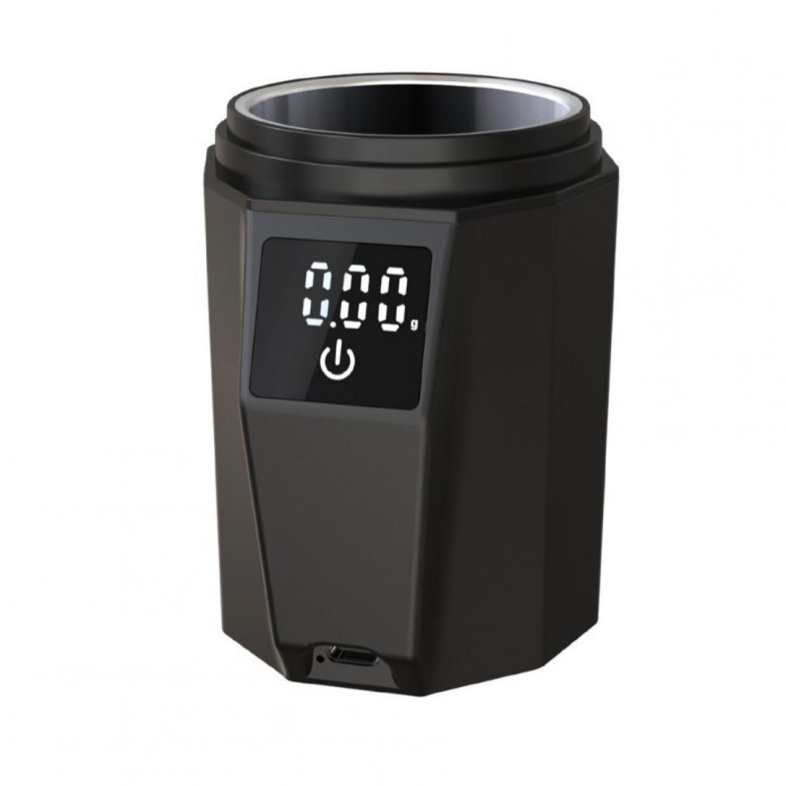 Ein schwarzes, sechseckiges Gerät mit digitaler Anzeige '0.00'. Unterhalb der Anzeige ist eine Ein/Aus-Taste zu sehen.