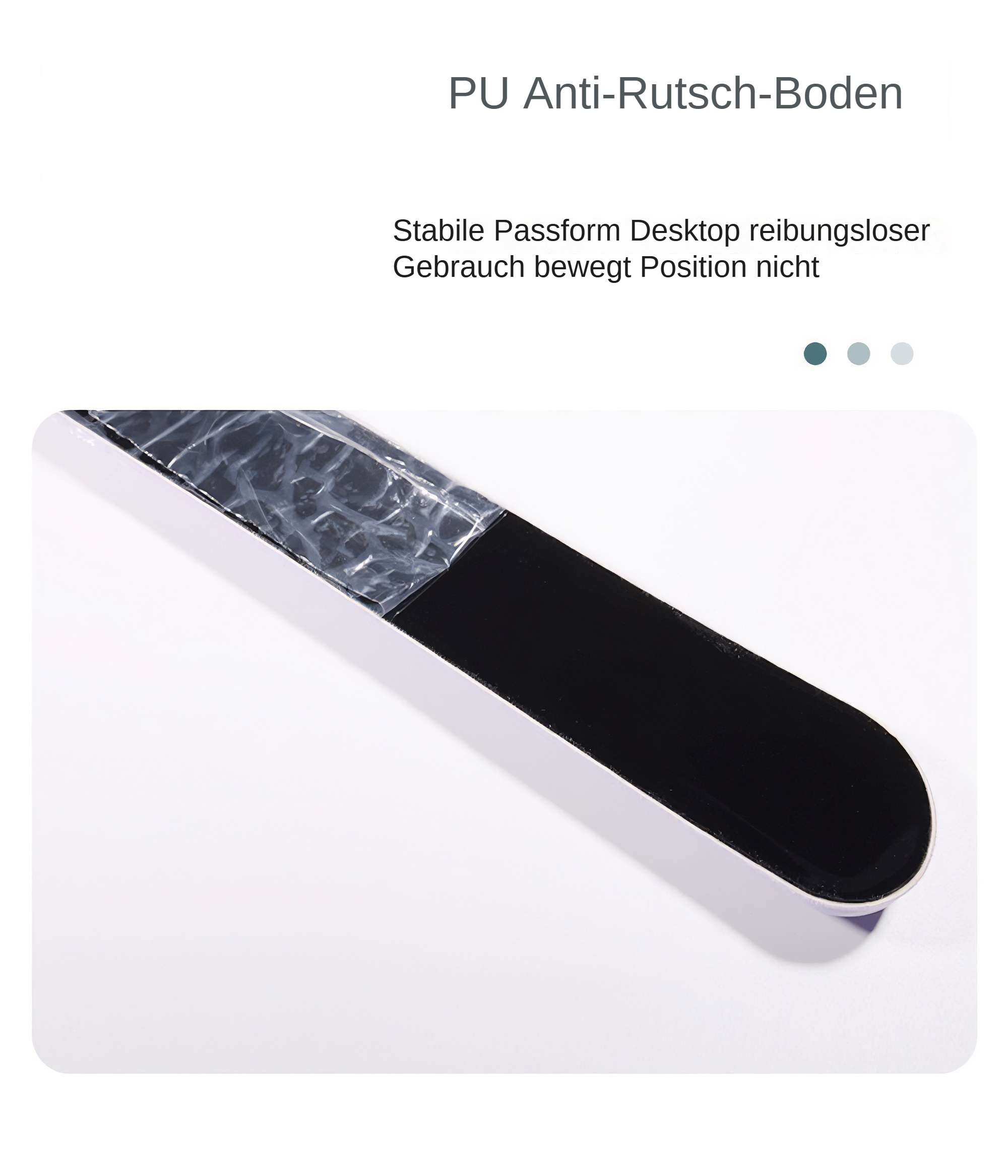 Ein schwarz-weißes Objekt auf weißem Untergrund. Text oben auf Deutsch. Objekt ist teilweise in Klarsichtfolie verpackt.