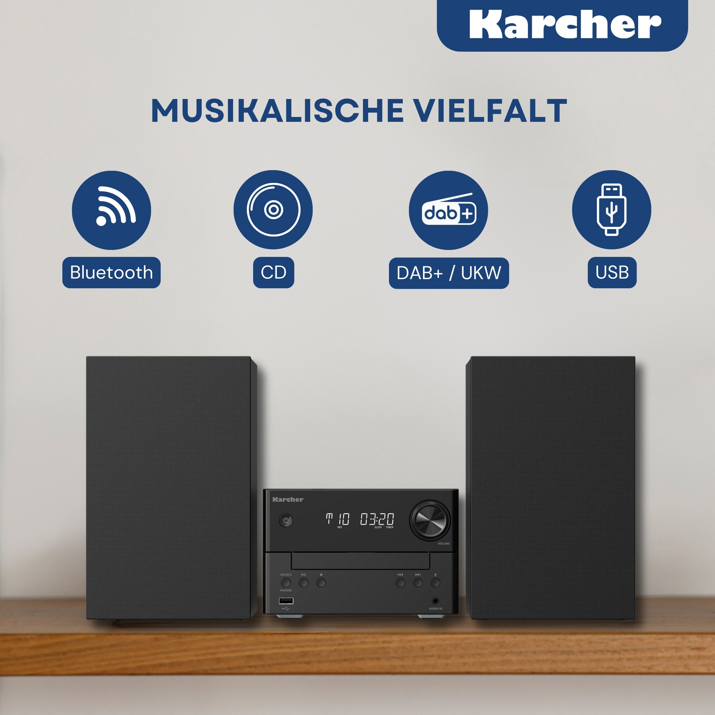 Schwarze Karcher Stereoanlage mit zwei Lautsprechern, Bluetooth, CD, DAB+/UKW und USB-Optionen auf Holz.
