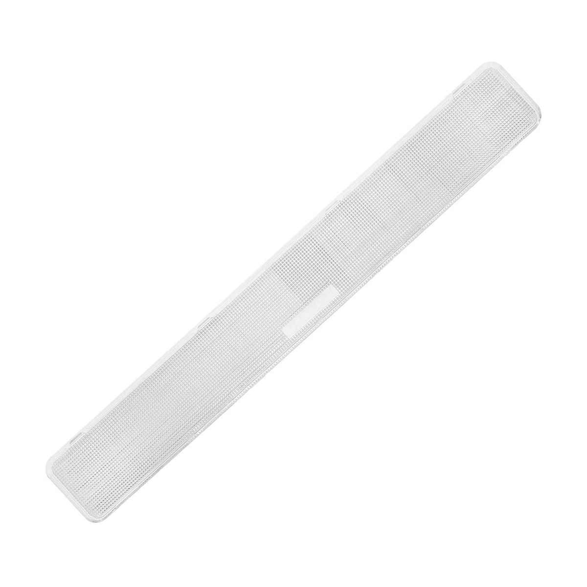 Una barra de sonido blanca y rectangular con un patrón de rejilla. Está colocada en diagonal sobre un fondo blanco. El diseño es minimalista.