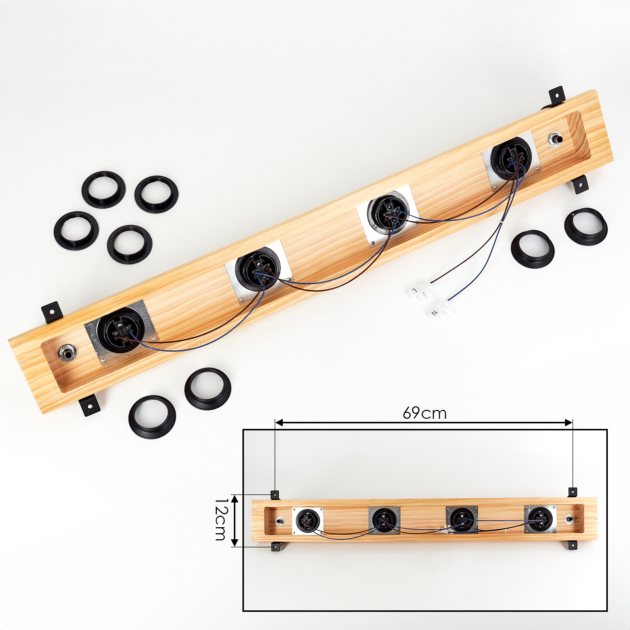 Holz-Lichtleiste mit vier Lautsprechern und schwarzen Ringen, Drähten und Maßangaben vor weißem Hintergrund.
