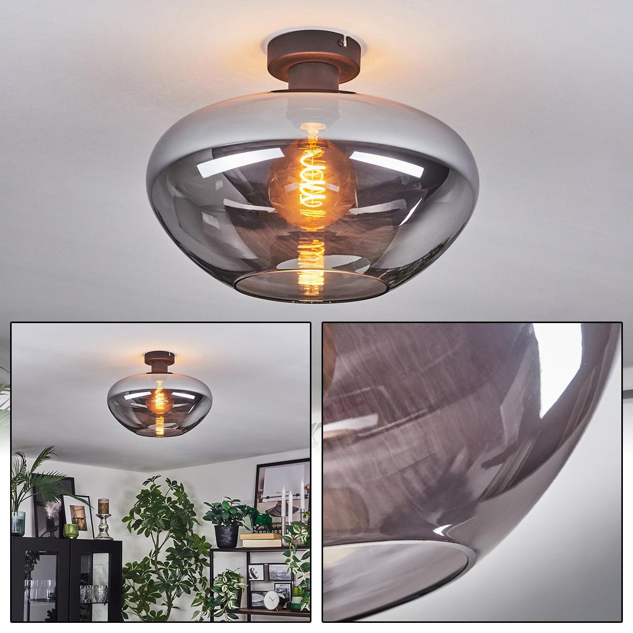 Eine moderne Deckenleuchte mit grauem Glasschirm und sichtbarer, warm getönter Glühbirne. Der Hintergrund zeigt ein Wohnzimmer.