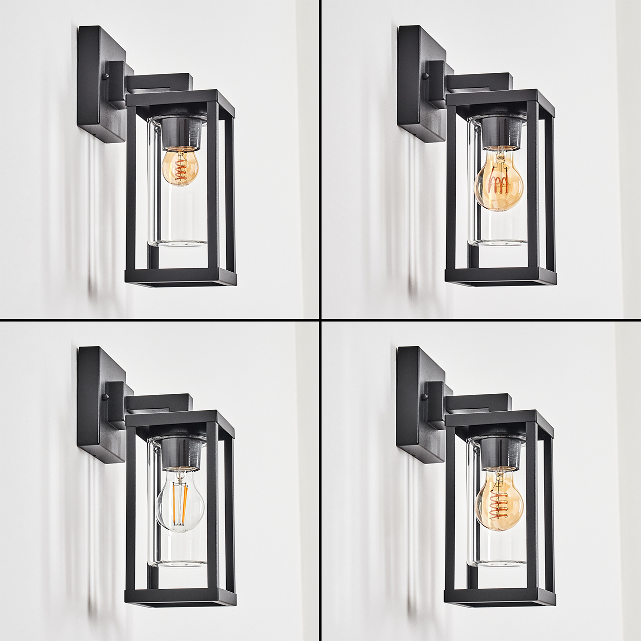 Vier schwarze Außenwandleuchten, jede mit Glasgehäuse und sichtbarer Glühbirne, vor einer weißen Wand.