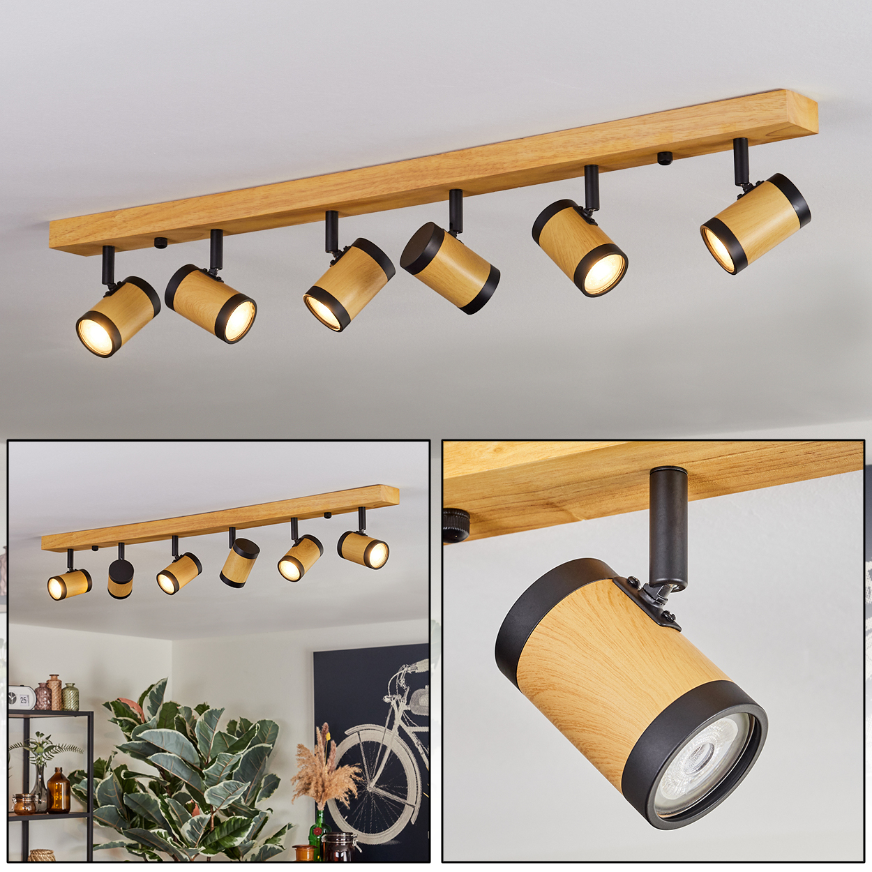 Eine Deckenleuchte aus Holzbalken mit sechs Strahlern. Die Leuchten haben Holzmaserung und schwarze Akzente. Die Lichter sind an.