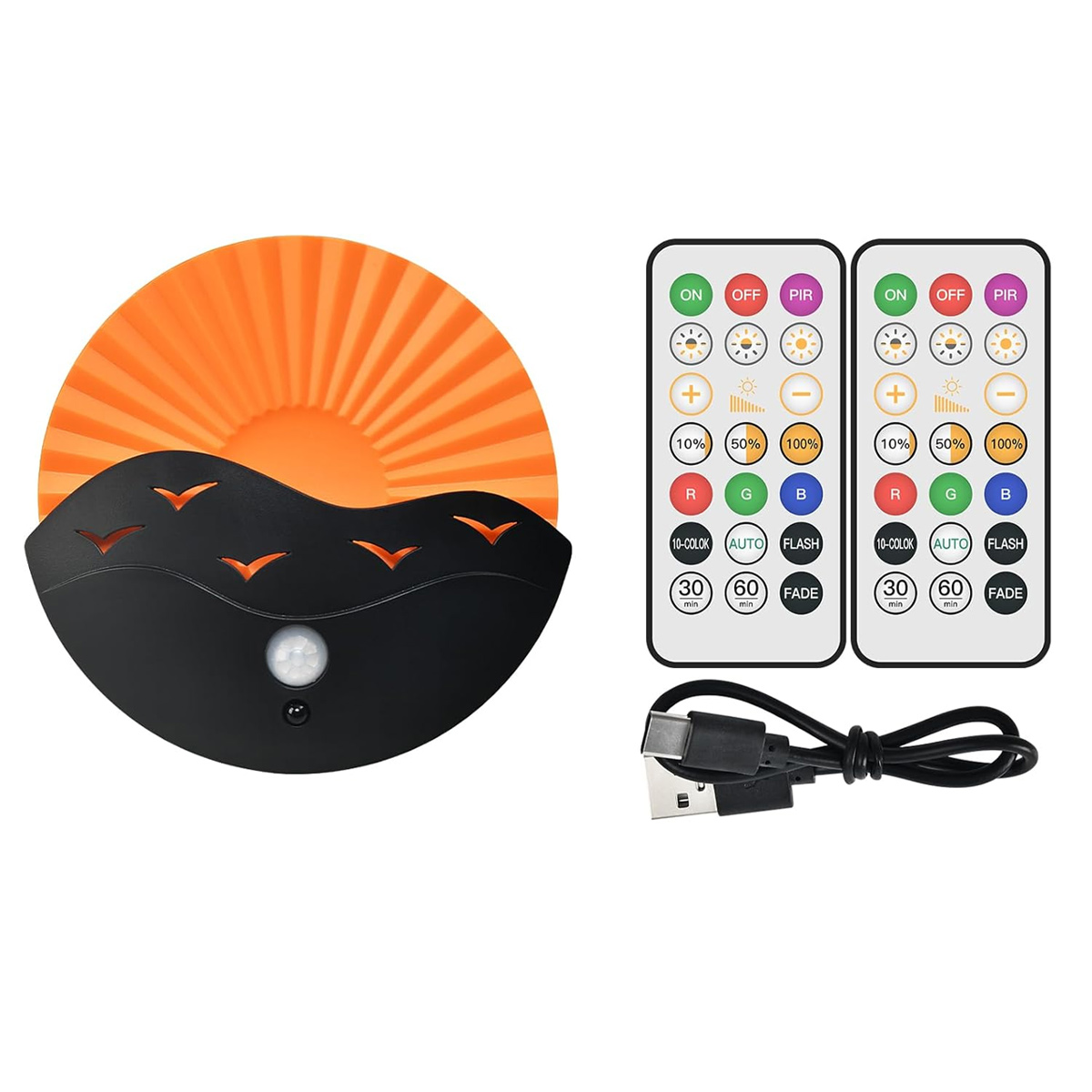 Ein orangefarbenes und schwarzes Nachtlicht mit zwei Fernbedienungen und einem USB-Kabel. Das Nachtlicht hat ein Sonnendesign mit einem Sensor.