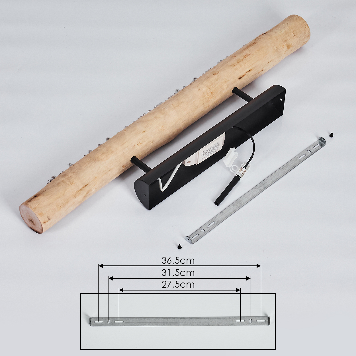 Holzbalken mit schwarzer Leuchte, Metallhalterung und Maßangaben. Komponenten sind auf weißer Oberfläche angeordnet.