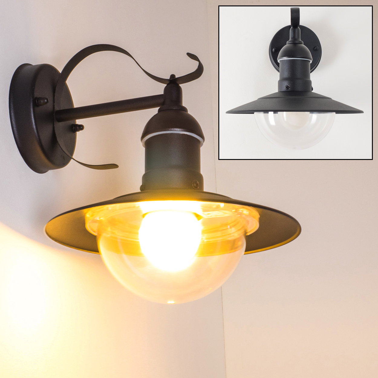 Schwarze Außenwandleuchte mit gebogenem Arm und Glaskugel, an einer weißen Wand montiert. Ein kleiner Einsatz zeigt die Details.