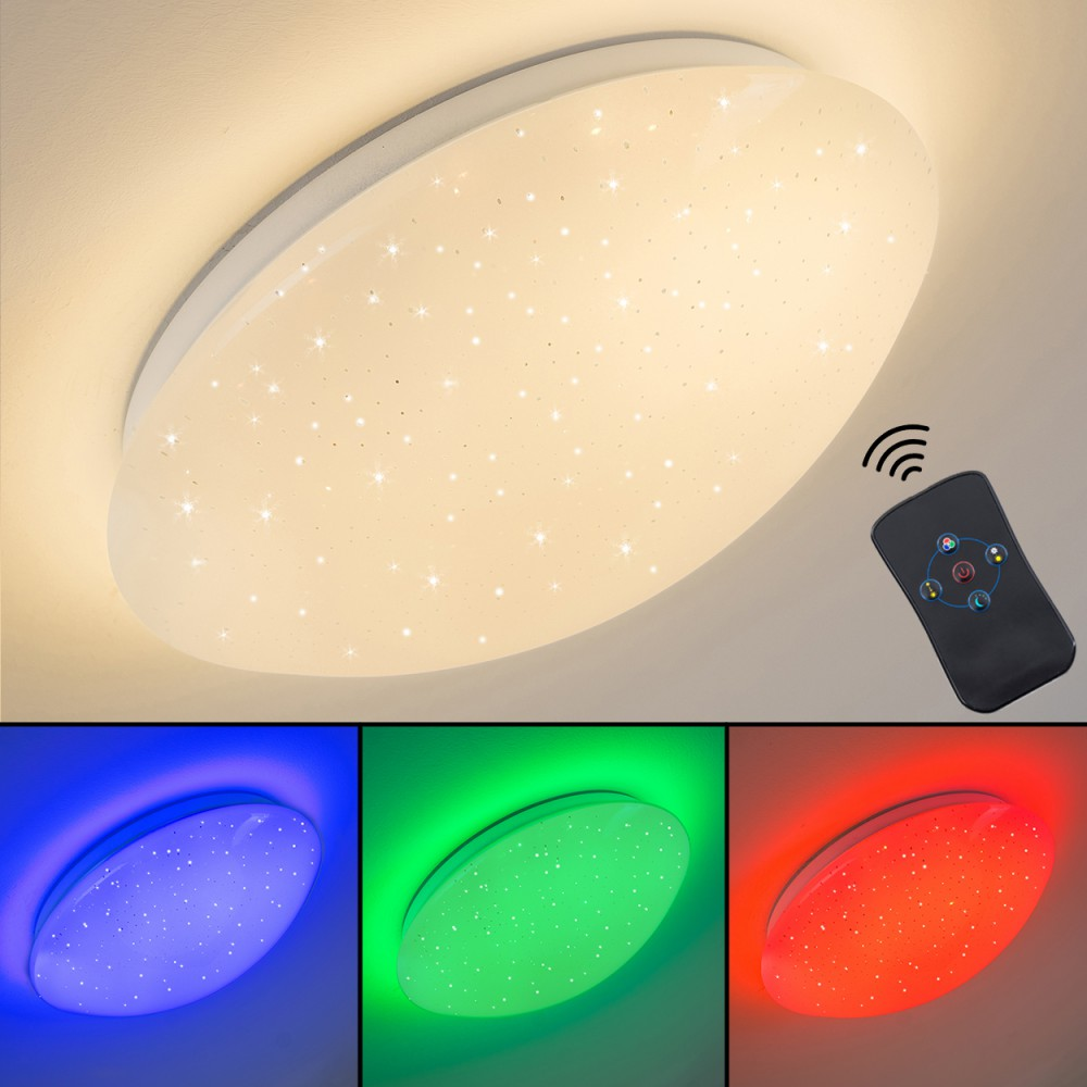 Eine weiße, ovale Deckenleuchte mit sternartigen Lichtern. Eine Fernbedienung wird gezeigt. Drei kleinere Lichter darunter sind blau, grün und rot.
