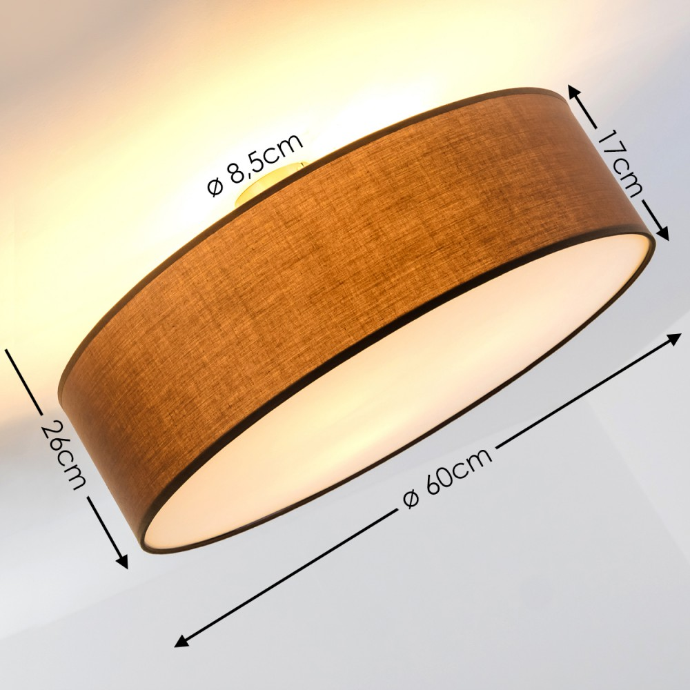 Braune zylindrische Lampe mit Maßen. Die Lampe hat ein weißes Innenleben. Abmessungen: 60cm Durchmesser, 26cm Höhe, 17cm Breite und 8,5cm Durchmesser.