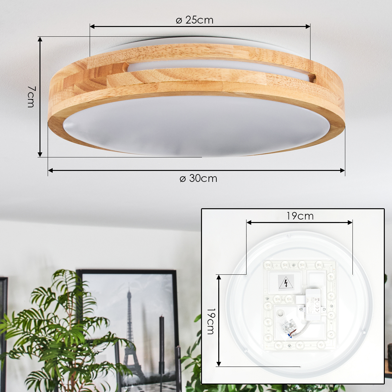 Deckenleuchte mit Holzrahmen. Maße sind angegeben. Zusätzliches Bild zeigt die internen Komponenten. Pflanze und Kunstwerke im Hintergrund.