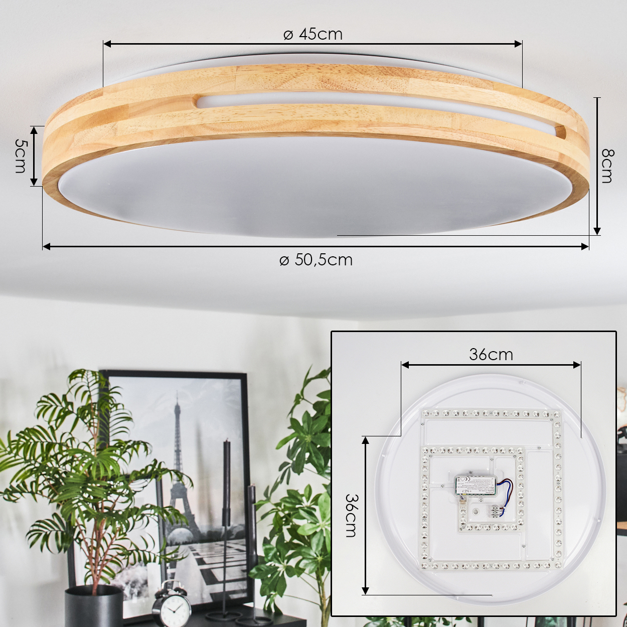Eine runde Deckenlampe aus Holz mit Maßen. Im Hintergrund sind ein Bild des Eiffelturms und Pflanzen zu sehen.