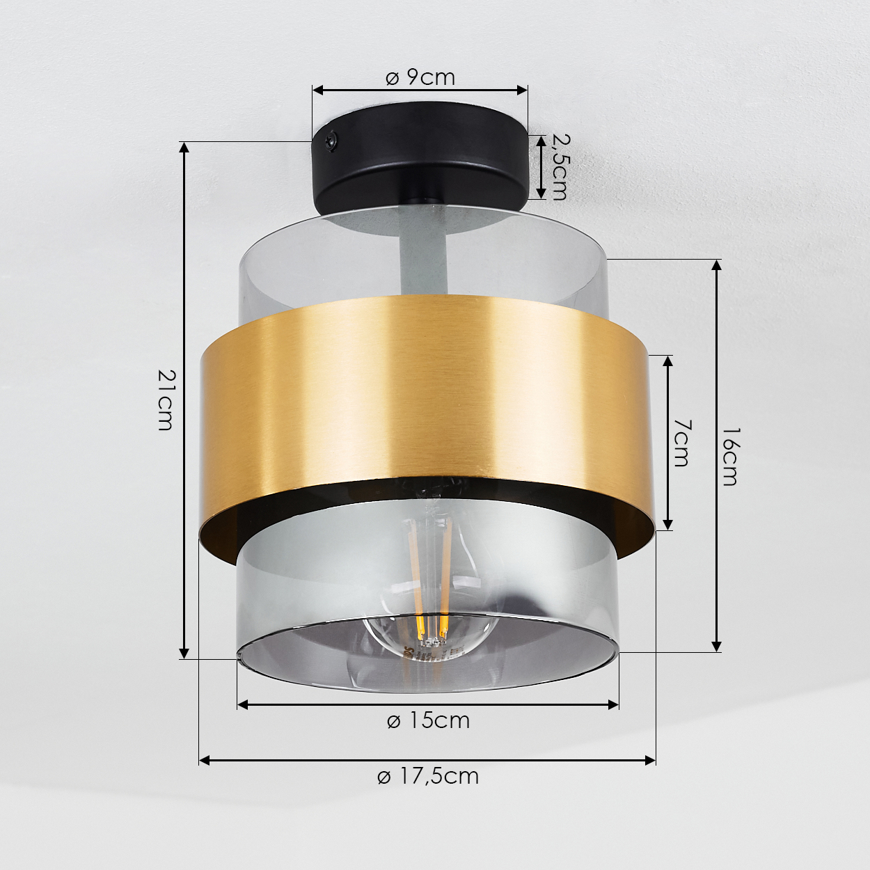 Eine moderne Deckenlampe mit Gold- und Klarglaselementen. Abmessungen sind beschriftet: 9cm, 2,5cm, 21cm, 7cm, 16cm, 15cm und 17,5cm.