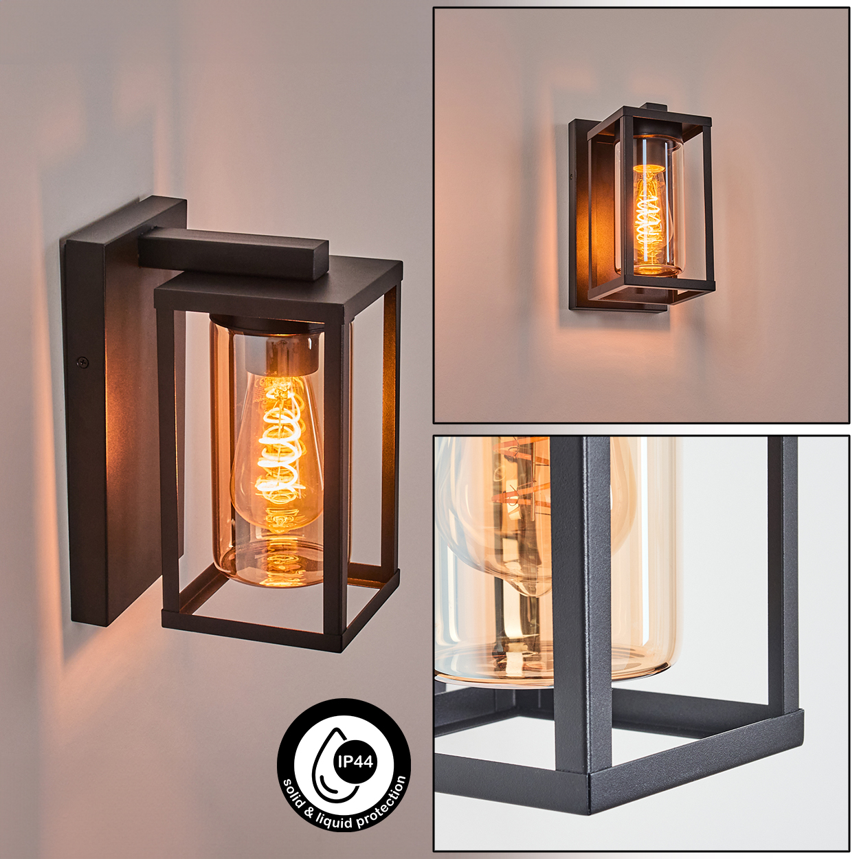 Schwarze Außenwandleuchte mit Glaseinfassung und dekorativer Glühbirne. Die Lampe ist an einer hellen Wand montiert.