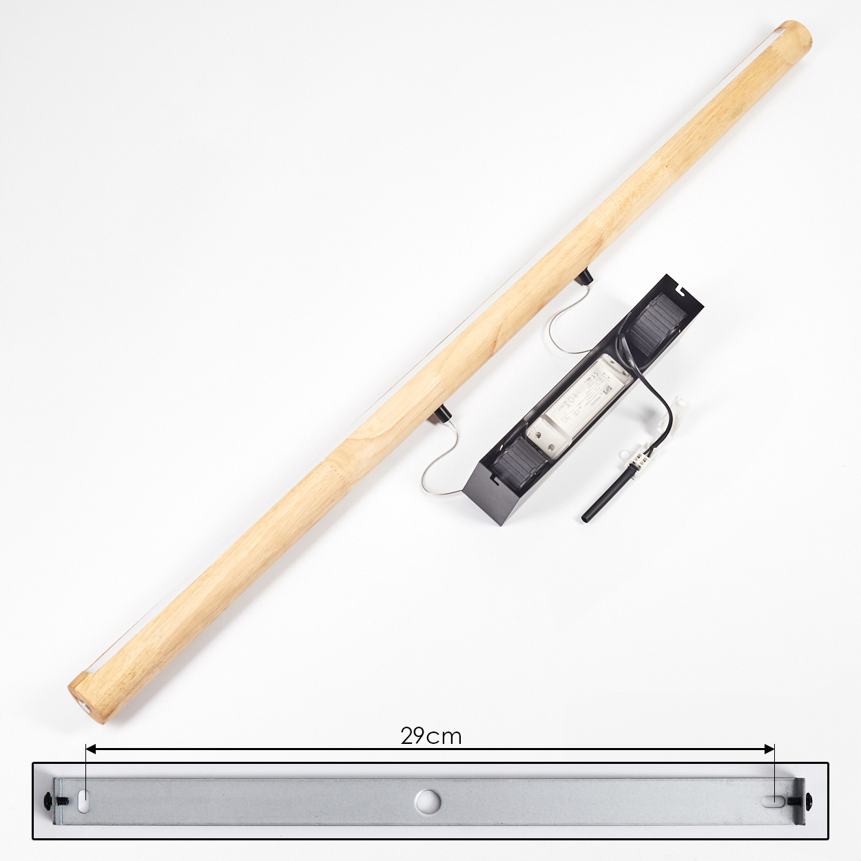 Holzstange mit Licht, Metallbefestigung und schwarzer elektrischer Komponente, darunter ein 29 cm langes Metallteil.