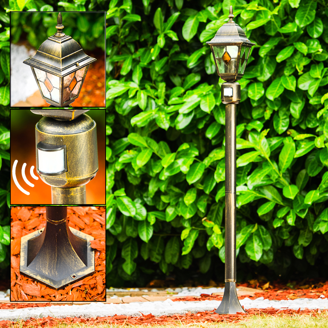 Eine bronzefarbene Außenlampe mit quadratischem Oberteil. Sie hat einen Bewegungssensor und ist von grünen Blättern, roter Mulche und Gras umgeben.