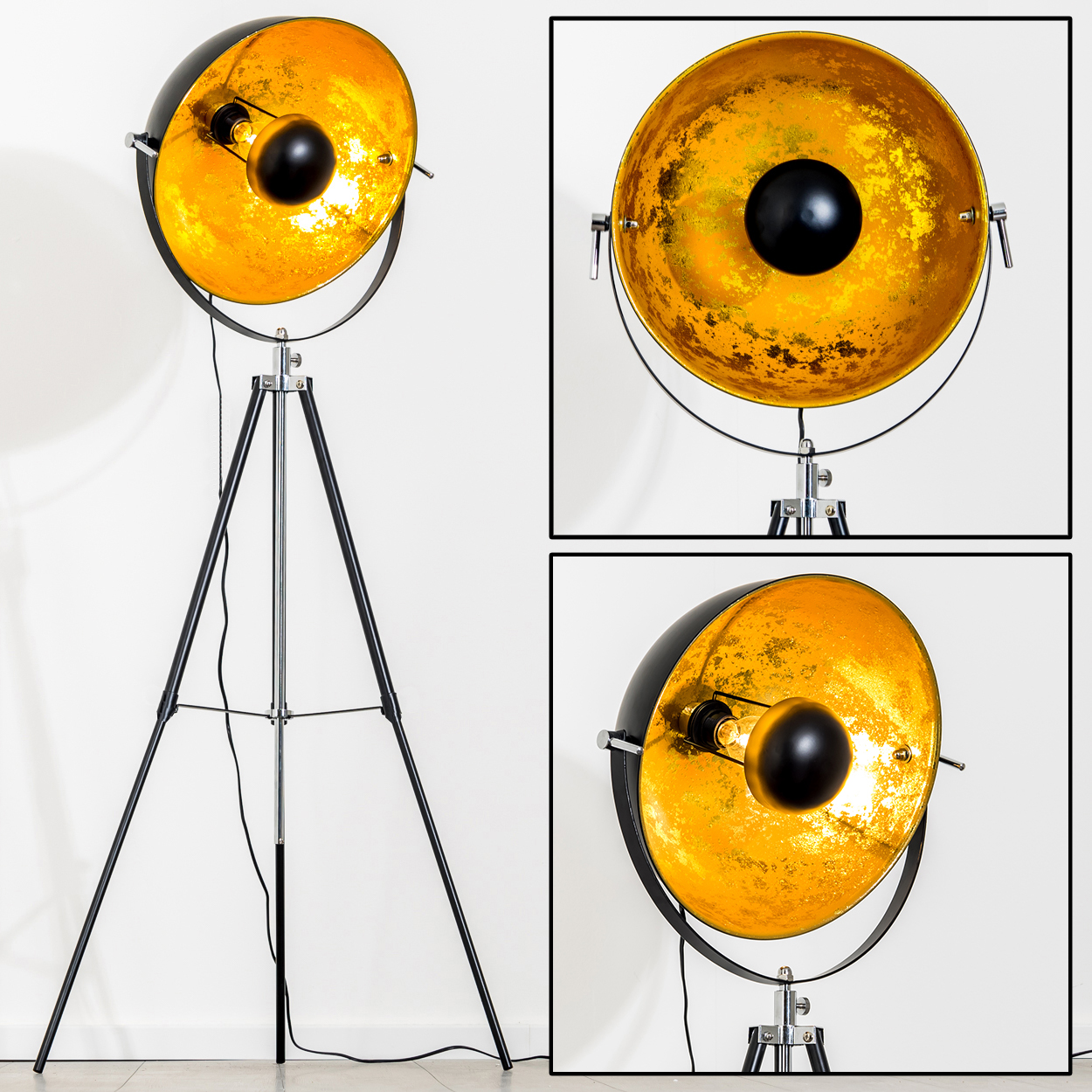 Eine schwarze und goldene Stehlampe mit Stativfuß. Die Lampe hat einen großen, runden Schirm mit goldener Innenseite und schwarzer Außenseite.