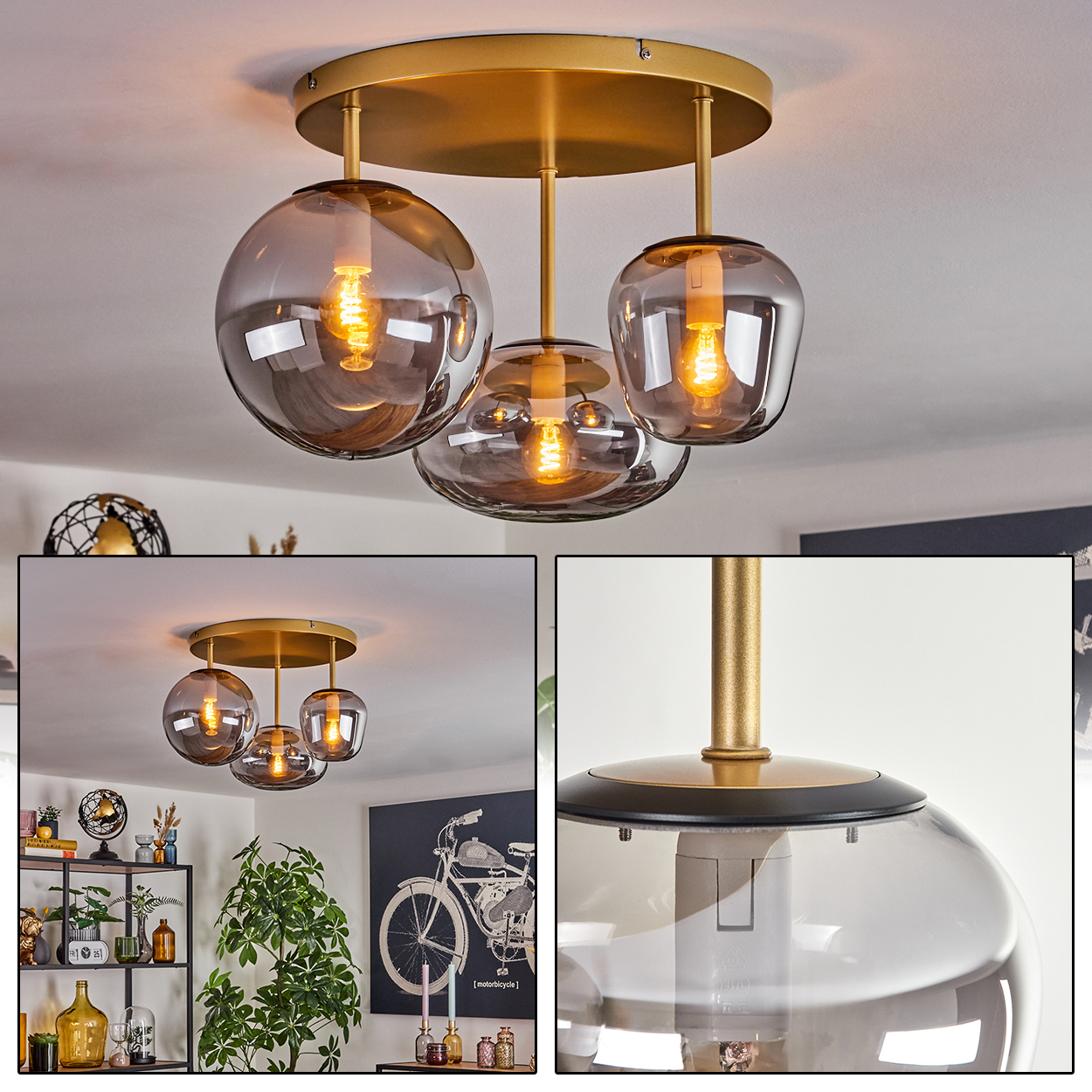 Deckenlampe mit drei rauchfarbenen Glasschirmen, goldfarbenen Halterungen. Im Hintergrund ein Raum mit Deko und einer Fahrradzeichnung an der Wand.