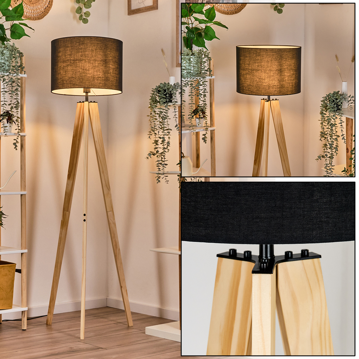 Eine hölzerne Stativ-Stehlampe mit schwarzem Lampenschirm. Im Hintergrund sind Regale mit Pflanzen und ein Holzboden zu sehen.