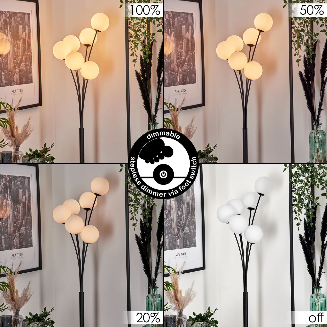 Eine schwarze Stehlampe mit mehreren weißen Kugelleuchten. Die Lampe steht in einem Raum mit gerahmten Bildern und Zierpflanzen.