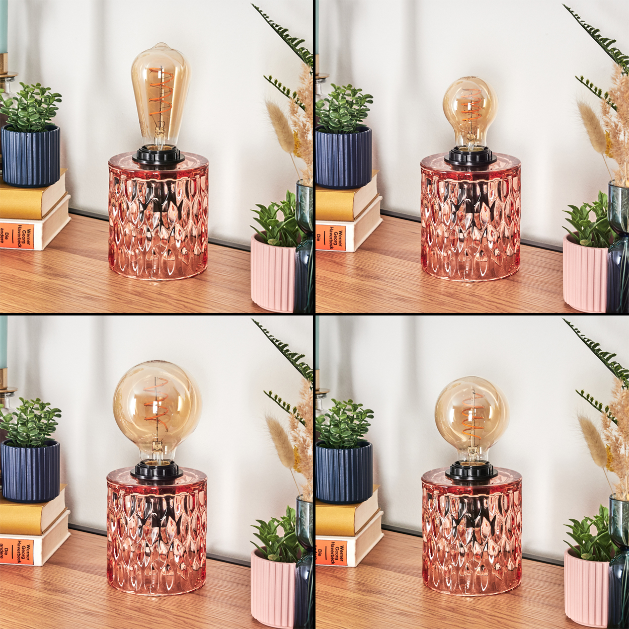 Ein Schreibtisch mit Lampe, kleinen Pflanzen, Büchern und dekorativen Vasen. Die Lampe hat einen rosa gemusterten Sockel und eine warme Glühbirne.
