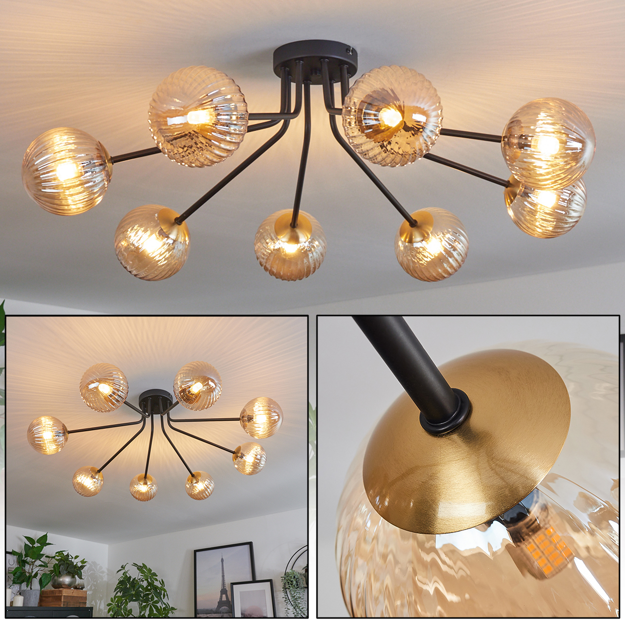 Eine Deckenlampe mit acht bernsteinfarbenen Glaskugeln. Die Arme sind schwarz, und die Halterung hat einen goldenen Akzent. Das Licht ist an.
