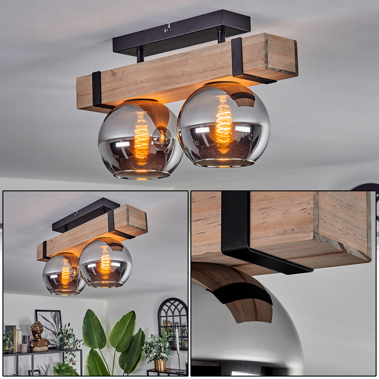 Deckenlampe mit zwei kugelförmigen Schirmen. Sie hat einen Holzbalken und schwarze Metallakzente. Die Glühbirnen leuchten hell.