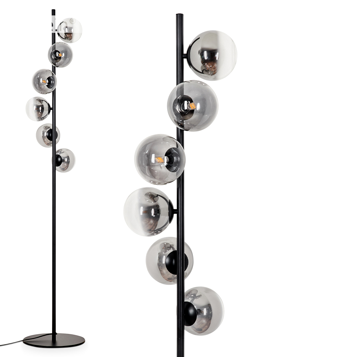 Eine schwarze Stehlampe mit mehreren Glaskugeln. Die Kugeln sind in einer vertikalen Linie angeordnet, und das Licht scheint durch sie.