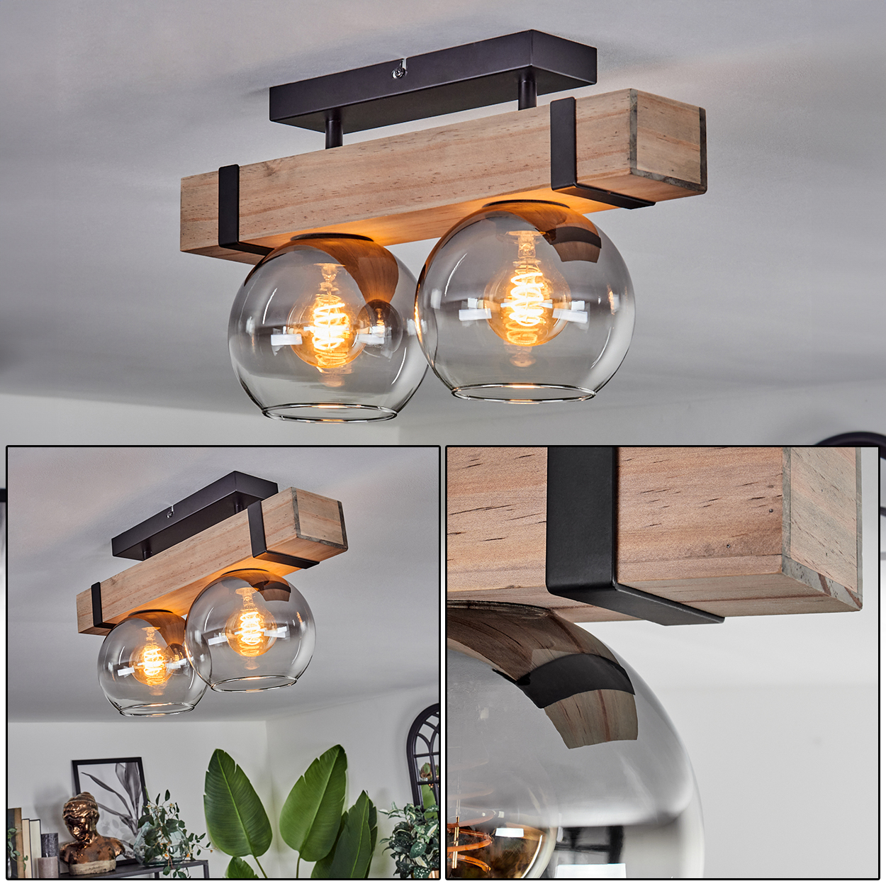 Deckenleuchte mit zwei Glaskugeln. Holzbalken und schwarze Metallstützen. Warme Glühbirnen. Weiße Decke. Dekorative Innenausstattung.
