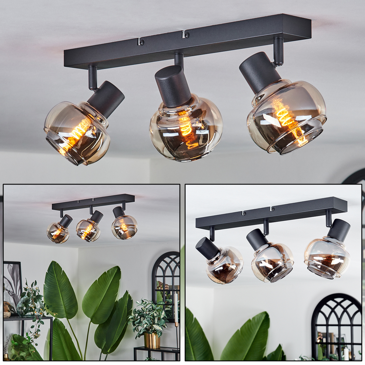 Drei schwarze Deckenstrahler mit bernsteinfarbenen Glasschirmen. Die Lichter sind abgewinkelt und zeigen das warme Licht der Glühbirnen.