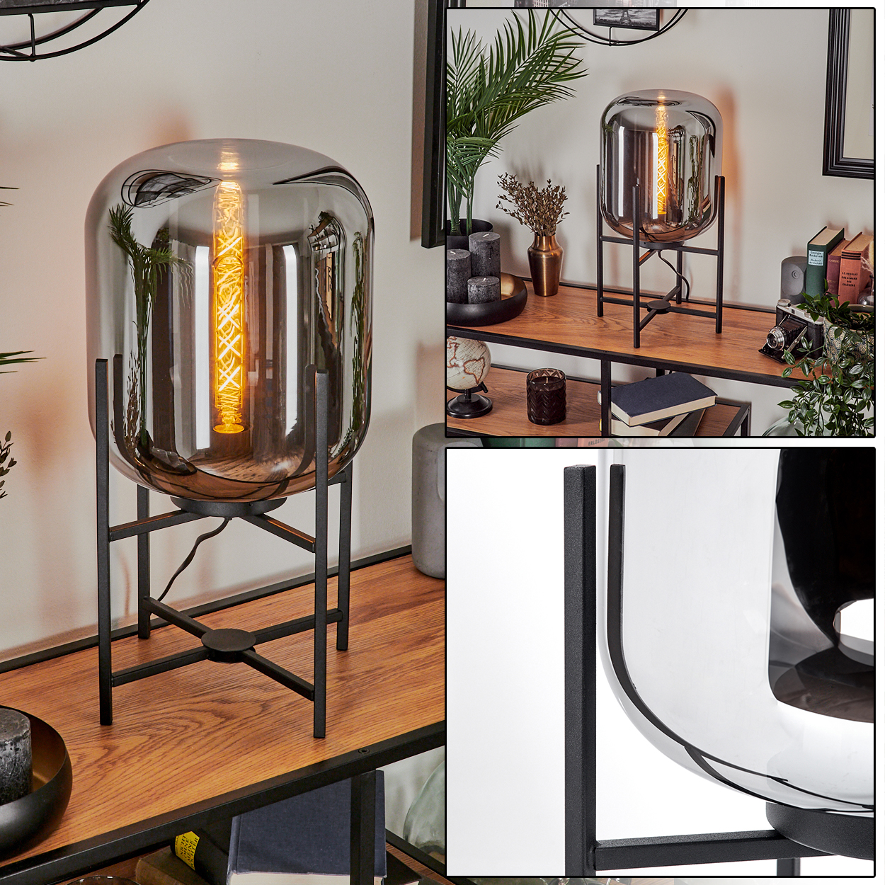 Eine moderne Lampe mit rauchfarbenem Glasschirm und sichtbarer Glühbirne. Sie steht auf einem schwarzen Metallrahmen, der auf einem Holzregal platziert ist.